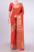 Brick Orange Soft Silk Saree with Jacquard With Zari Butta on the body and Zari Border displayed on a mannequin