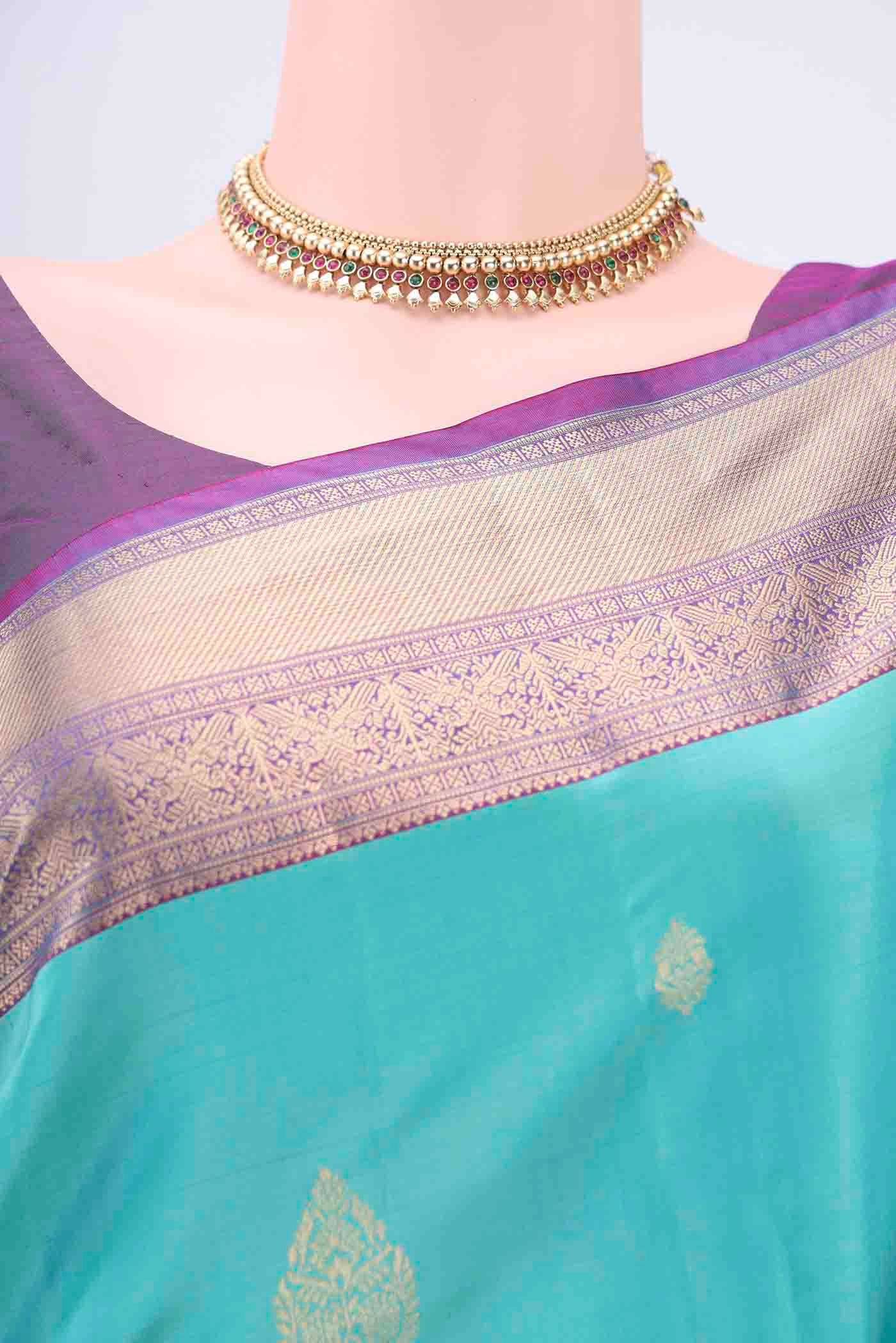 Border image of Light Blue Soft Silk Saree with Zari Butta on the body and Zari Border