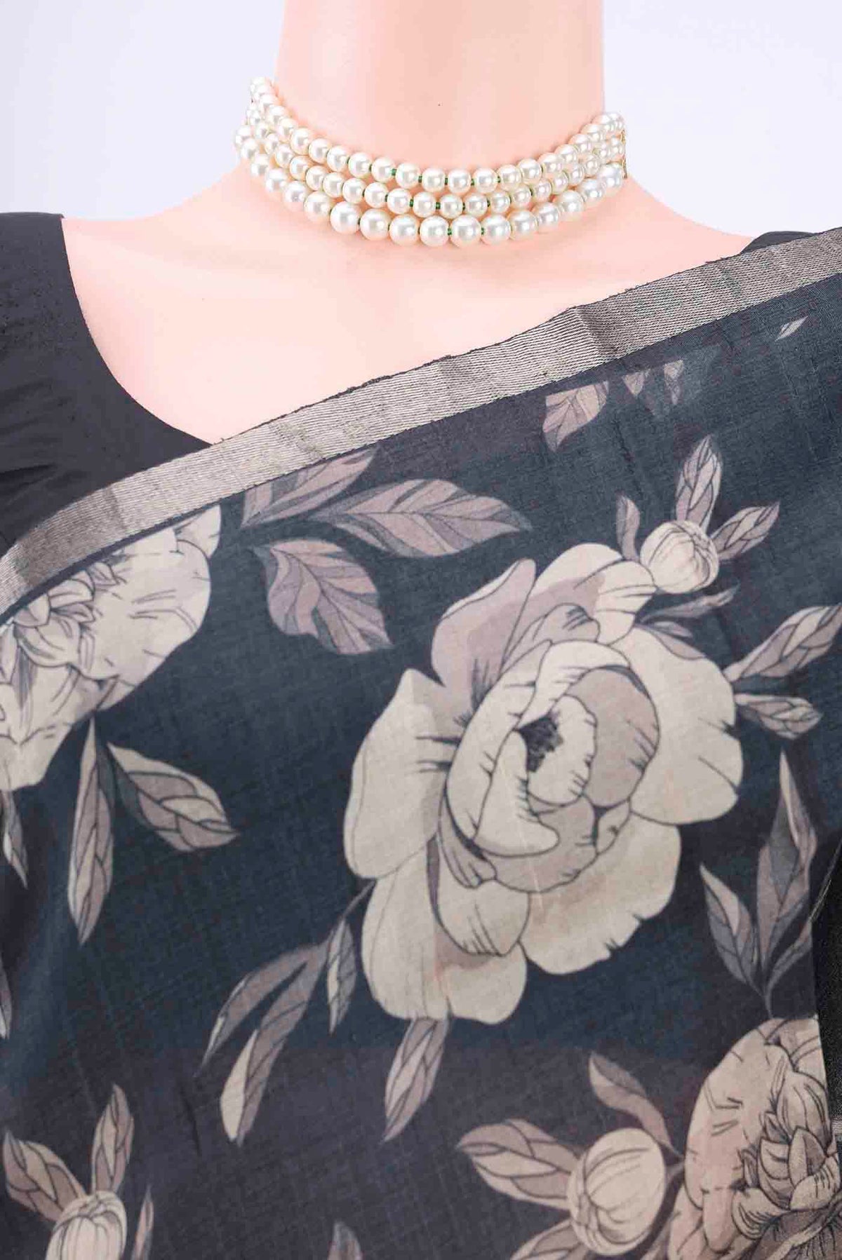 Border image of Black Dual Tone Tussar Silk Saree with Floral Print on the body and Zari Border