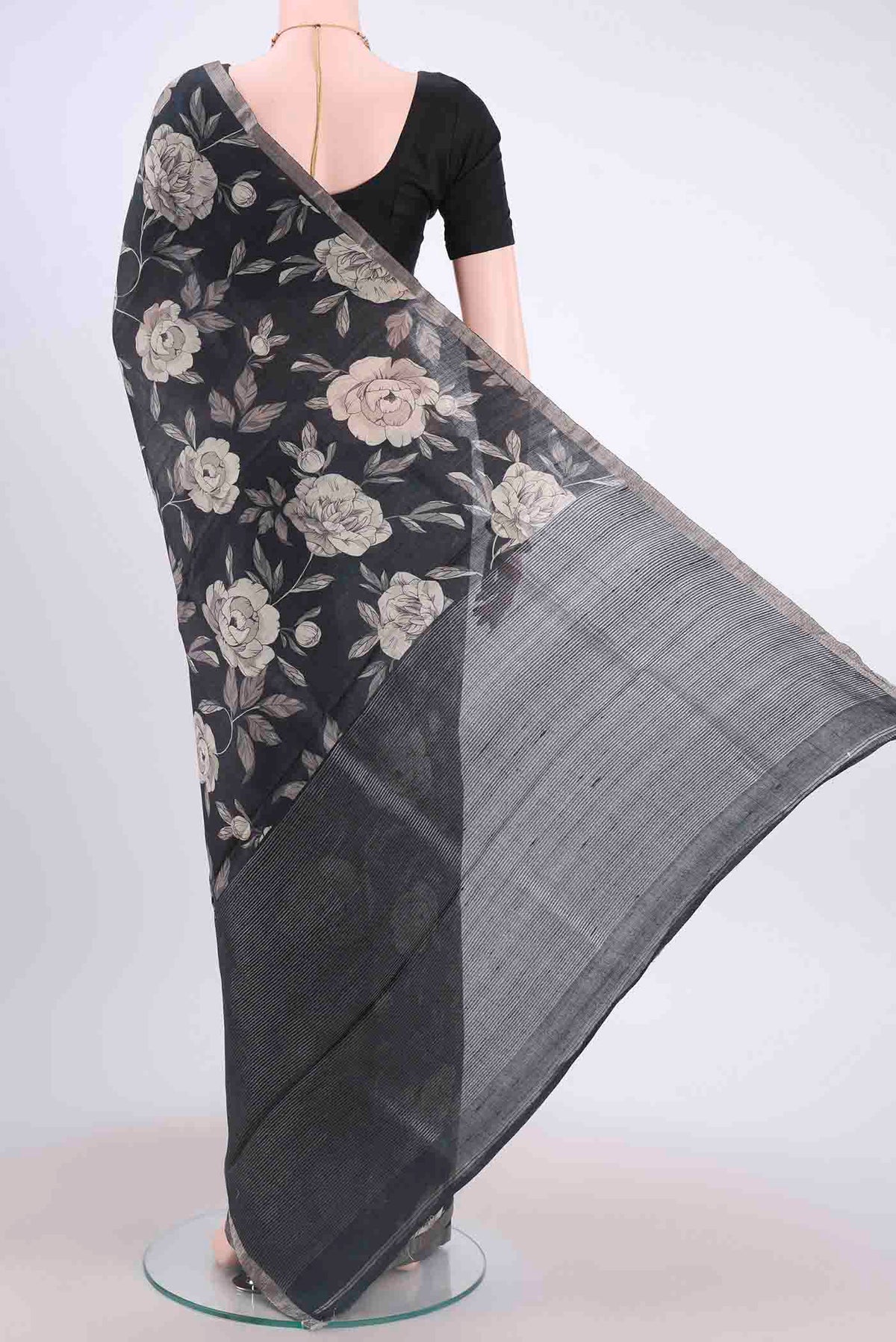 Flat view of Black Dual Tone Tussar Silk Saree with Floral Print on the body and Zari Border