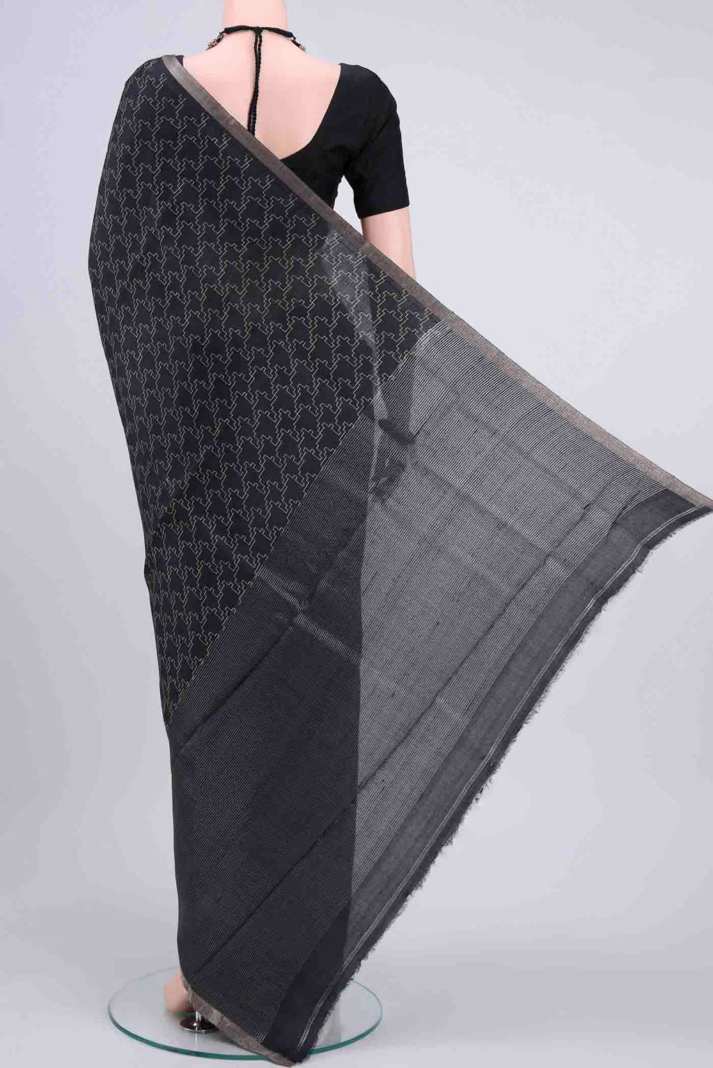 Flat view of Black Dual Tone Tussar Silk Saree with Geometric Print on the body and Zari Border