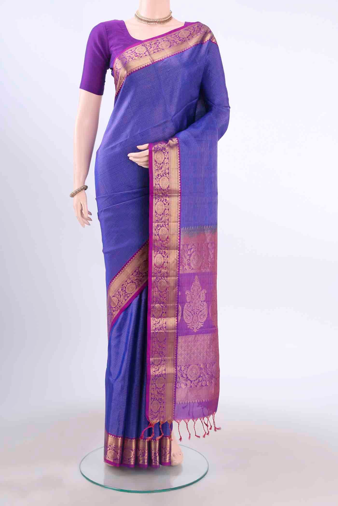 Purple Soft Silk Saree with Zari Brocade on the body and Zari Border displayed on a mannequin