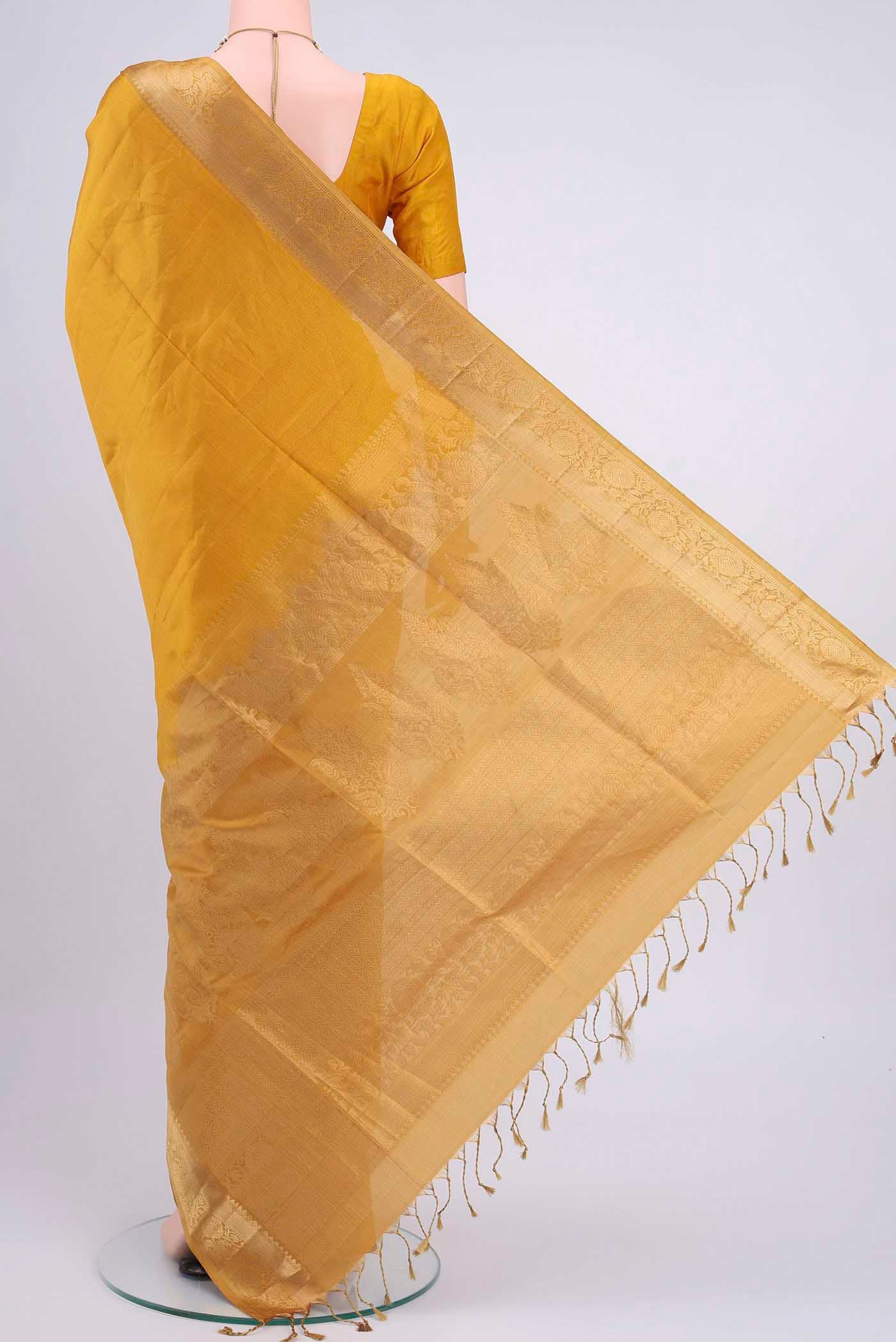 Flat view of Yellow Soft Silk Saree with Checked design on the body and Zari Border