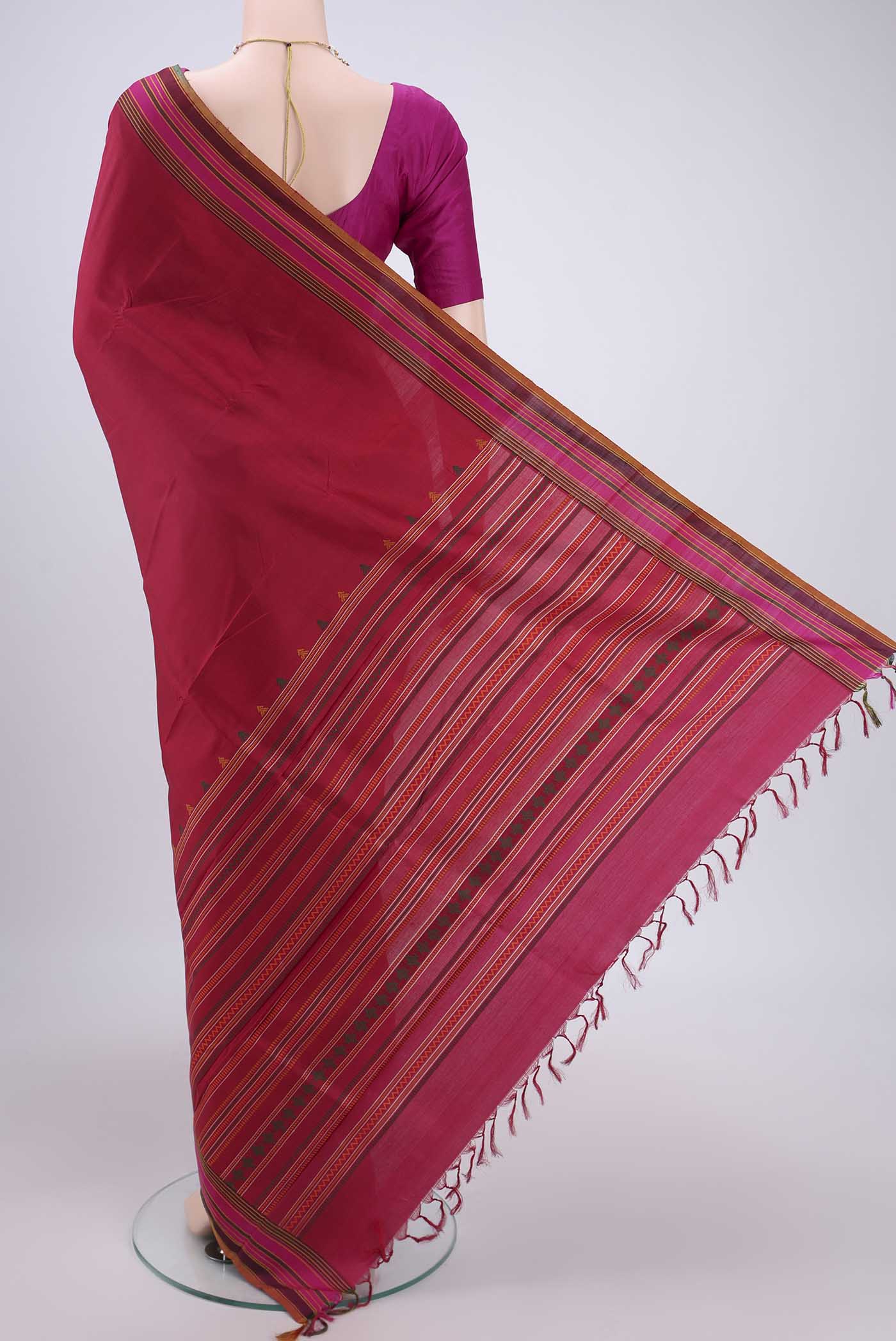 Flat view of Maroon Kanjivaram Saree with Checked design on the body and Thread Border. 