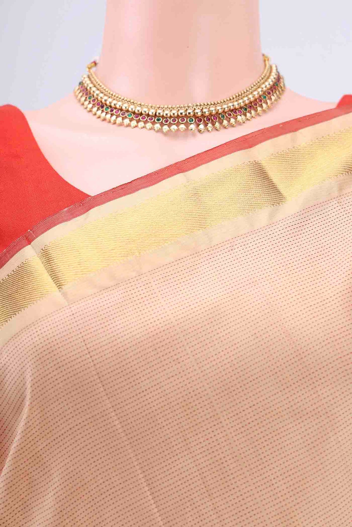 Border image of Beige Kanchipuram Saree with Stripes on the body and Zari Border
