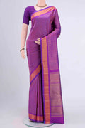 Pure Silk Pure Zari Magenta Kanchipuram Saree with Zari Brocade on the body and Zari Border displayed on a mannequin