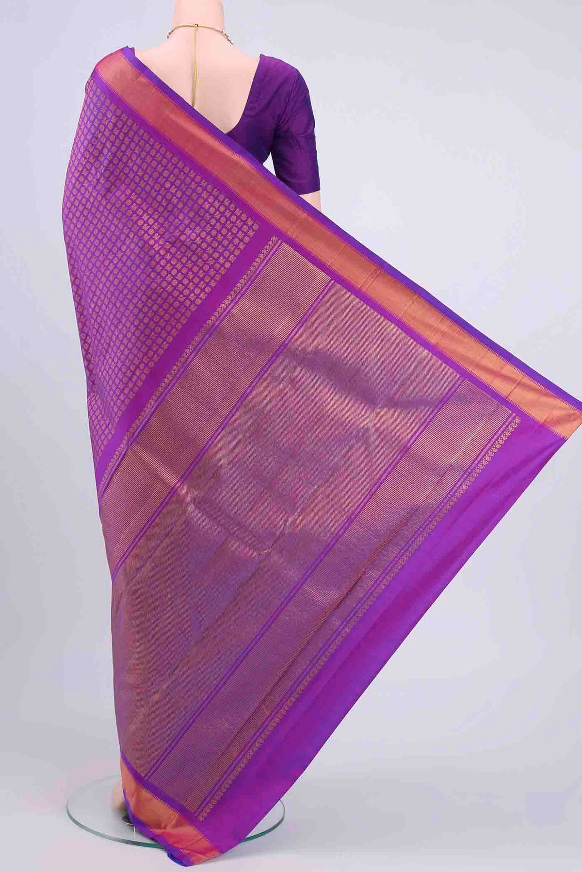 Flat view of Pure Silk Pure Zari Magenta Kanchipuram Saree with Zari Brocade on the body and Zari Border