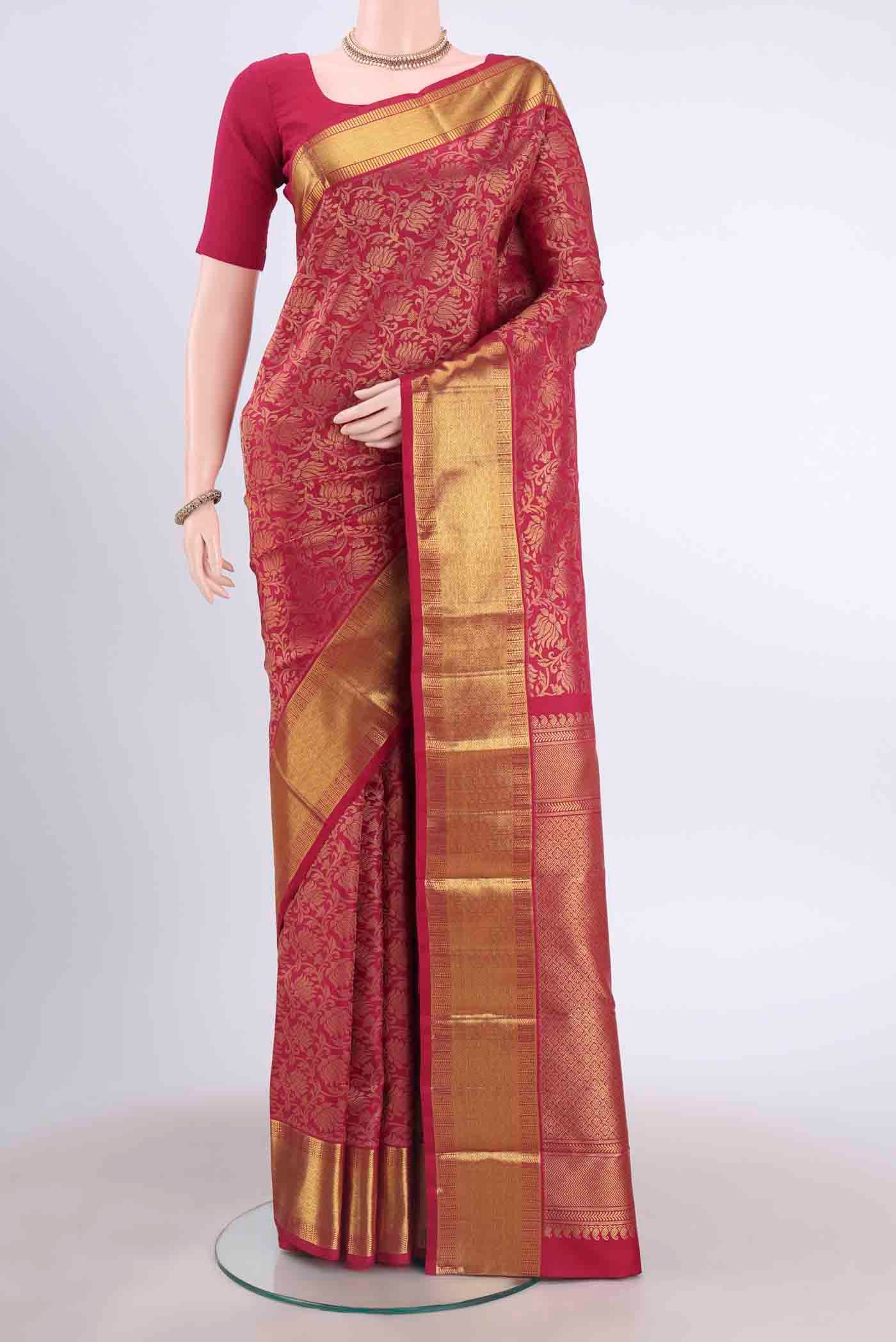 Pure Silk Pure Zari Maroon Kanchipuram Saree with Zari Brocade on the body and Zari Border displayed on a mannequin