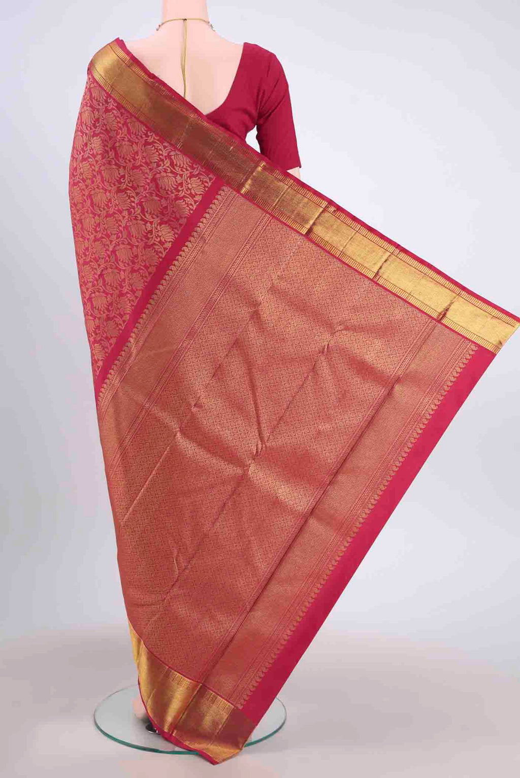 Flat view of Pure Silk Pure Zari Maroon Kanchipuram Saree with Zari Brocade on the body and Zari Border