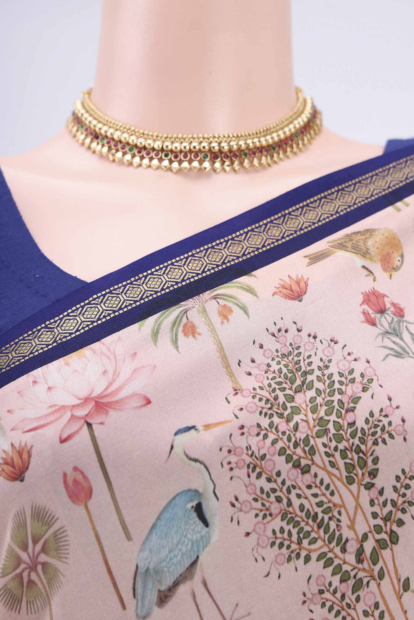 Border image of Peach Mysore Crepe Saree with Floral Print on the body and Zari Border. 