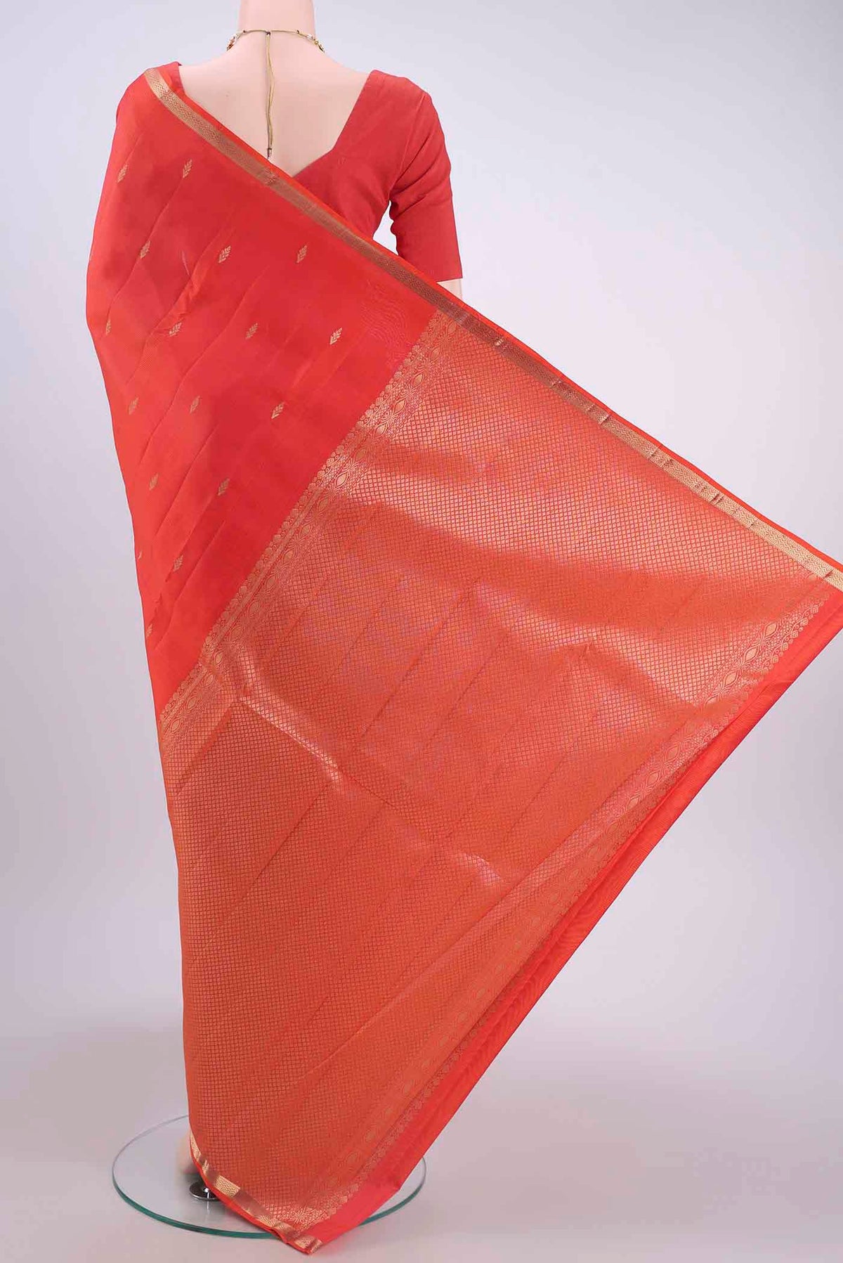 Flat view of Orange Nangavalli Silk [ Salem ] Saree with Zari Butta on the body and Zari Border