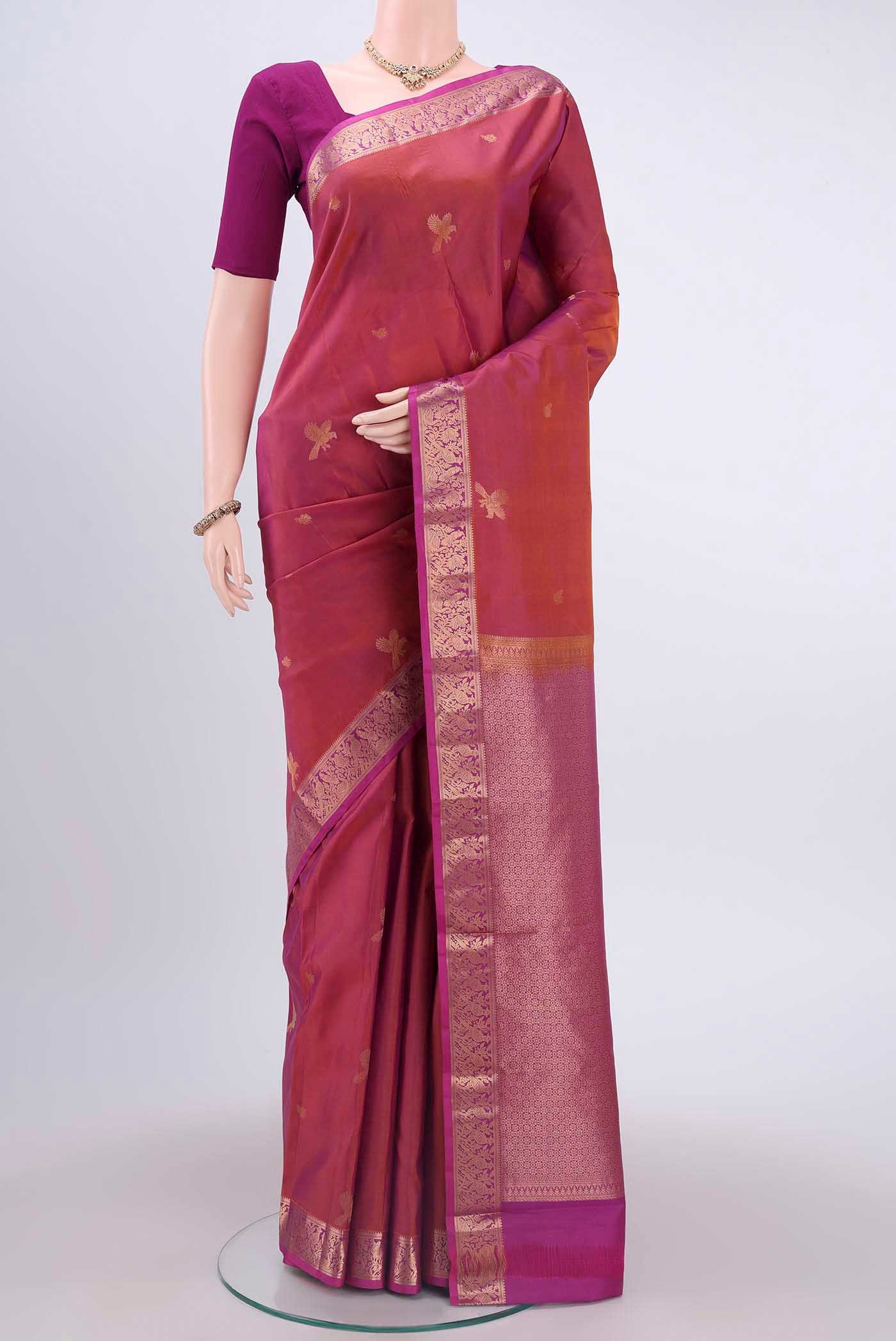 Coral Dual Tone Nangavalli Silk [ Salem ] Saree with Zari Butta on the body and Zari Border displayed on a mannequin