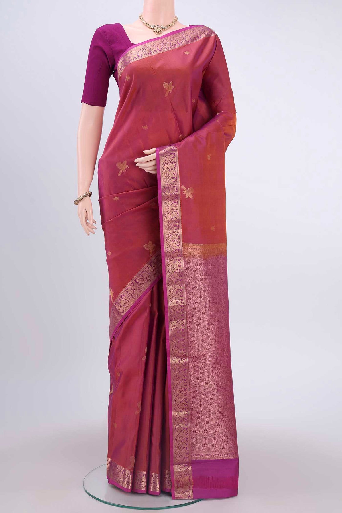 Coral Dual Tone Nangavalli Silk [ Salem ] Saree with Zari Butta on the body and Zari Border displayed on a mannequin