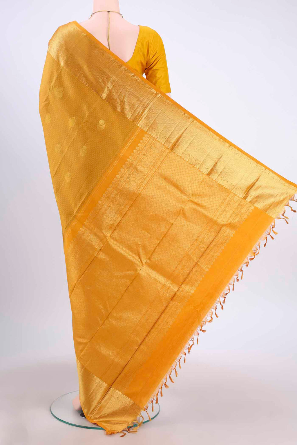 Flat view of Pure Silk Pure Zari Mustard Kanchipuram Saree with Jacquard With Zari Butta on the body and Zari Border