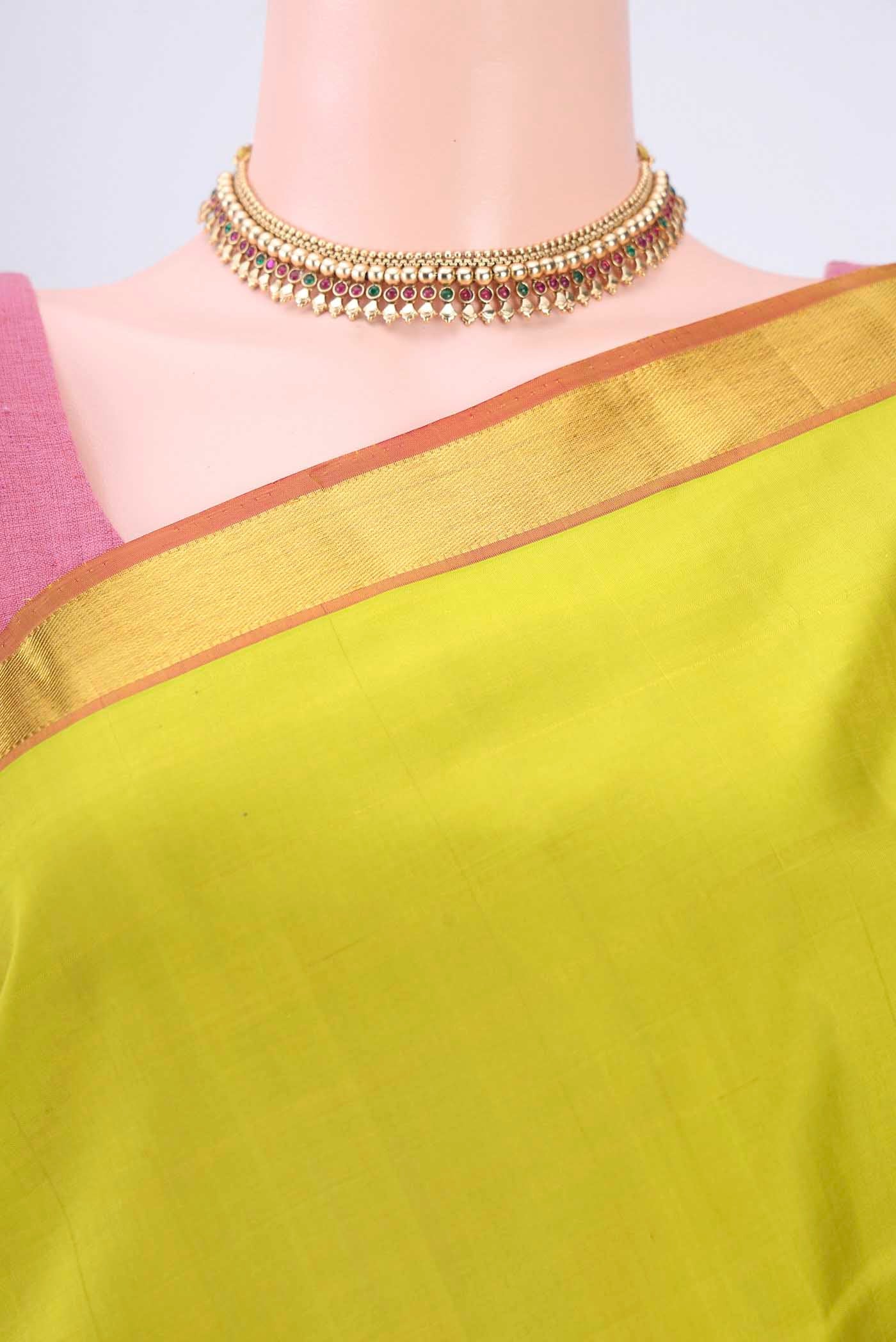 Border image of Acid Green Kanchipuram Saree with Plain Body and Zari Border