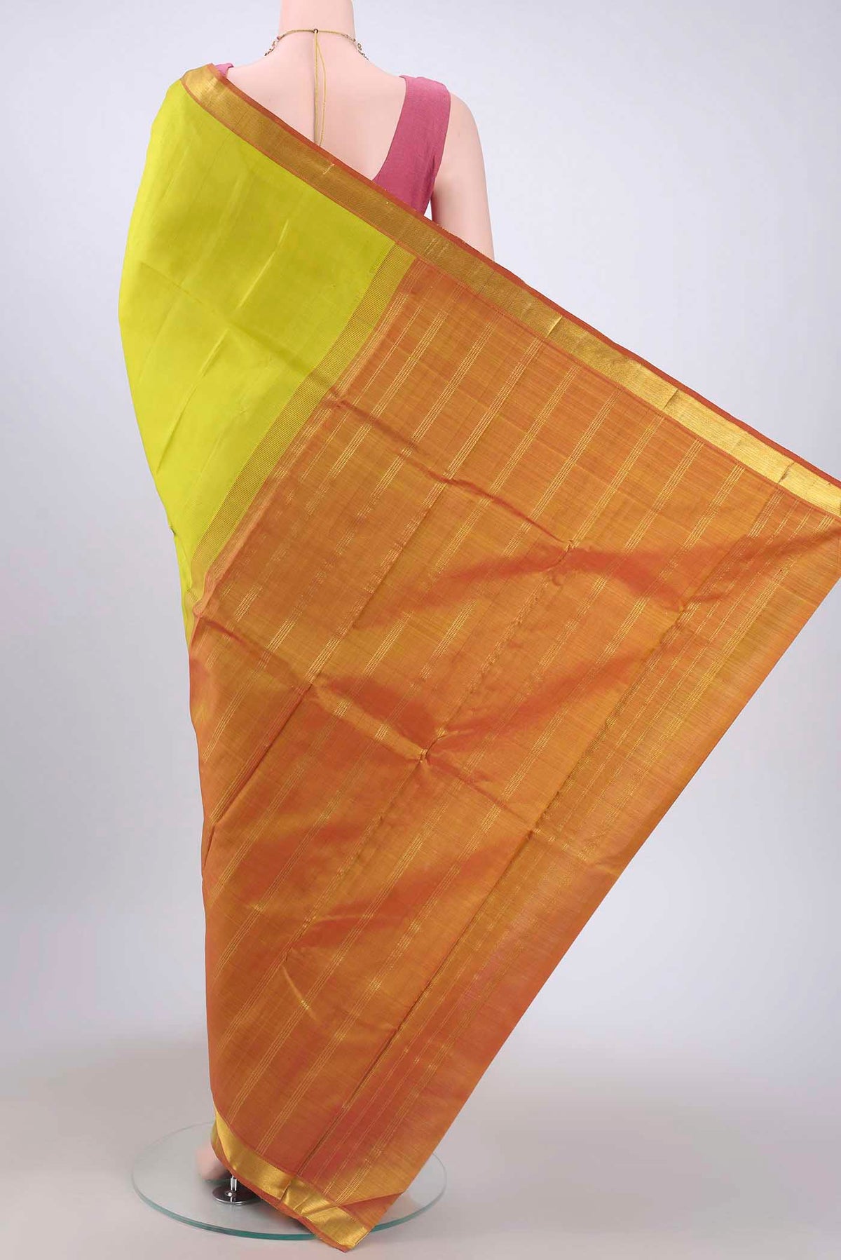 Flat view of Acid Green Kanchipuram Saree with Plain Body and Zari Border