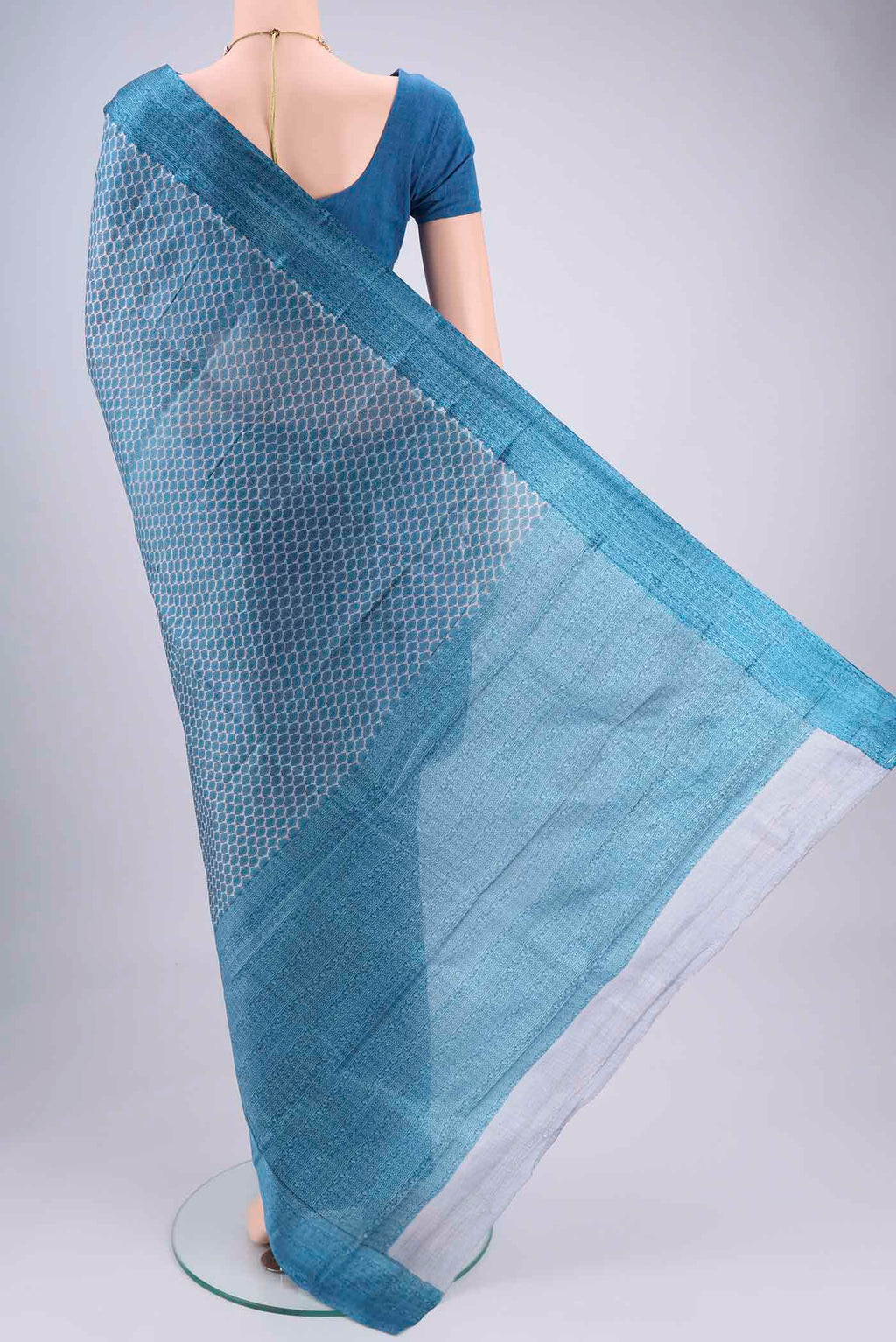 Flat view of Blue Grey Printed Silk Saree with Floral Print on the body and Printed Border. 