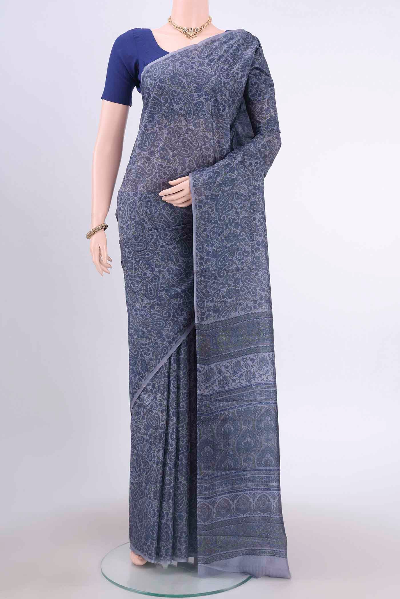 Blue Grey Printed Silk Saree with Floral Print on the body and Plain Border displayed on a mannequin