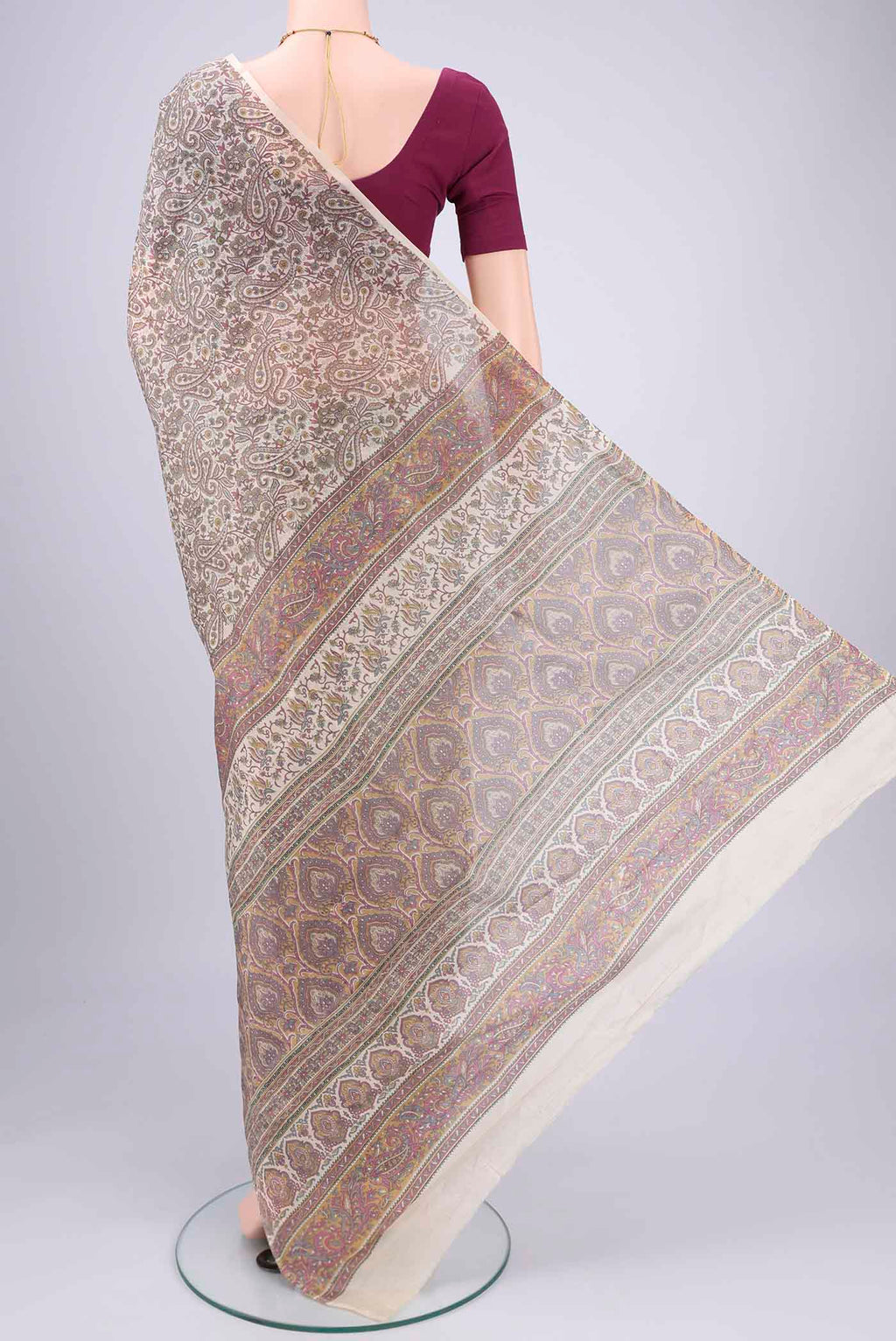 Flat view of Off White Printed Silk Saree with Floral Print on the body and Printed Border. 