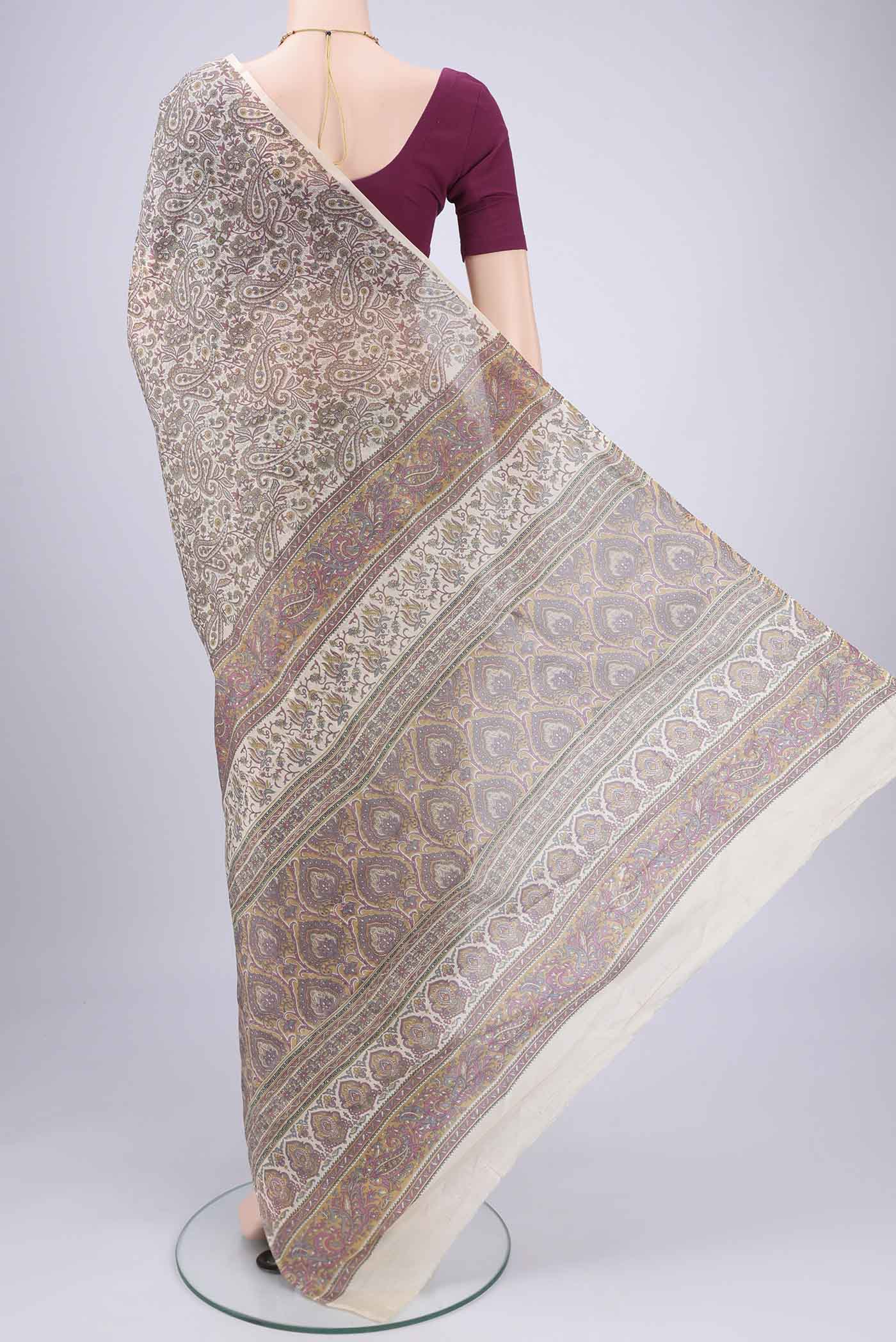 Flat view of Off White Printed Silk Saree with Floral Print on the body and Printed Border. 