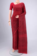 Red Printed Silk Saree with Floral Print on the body and Printed Border.  displayed on a mannequin