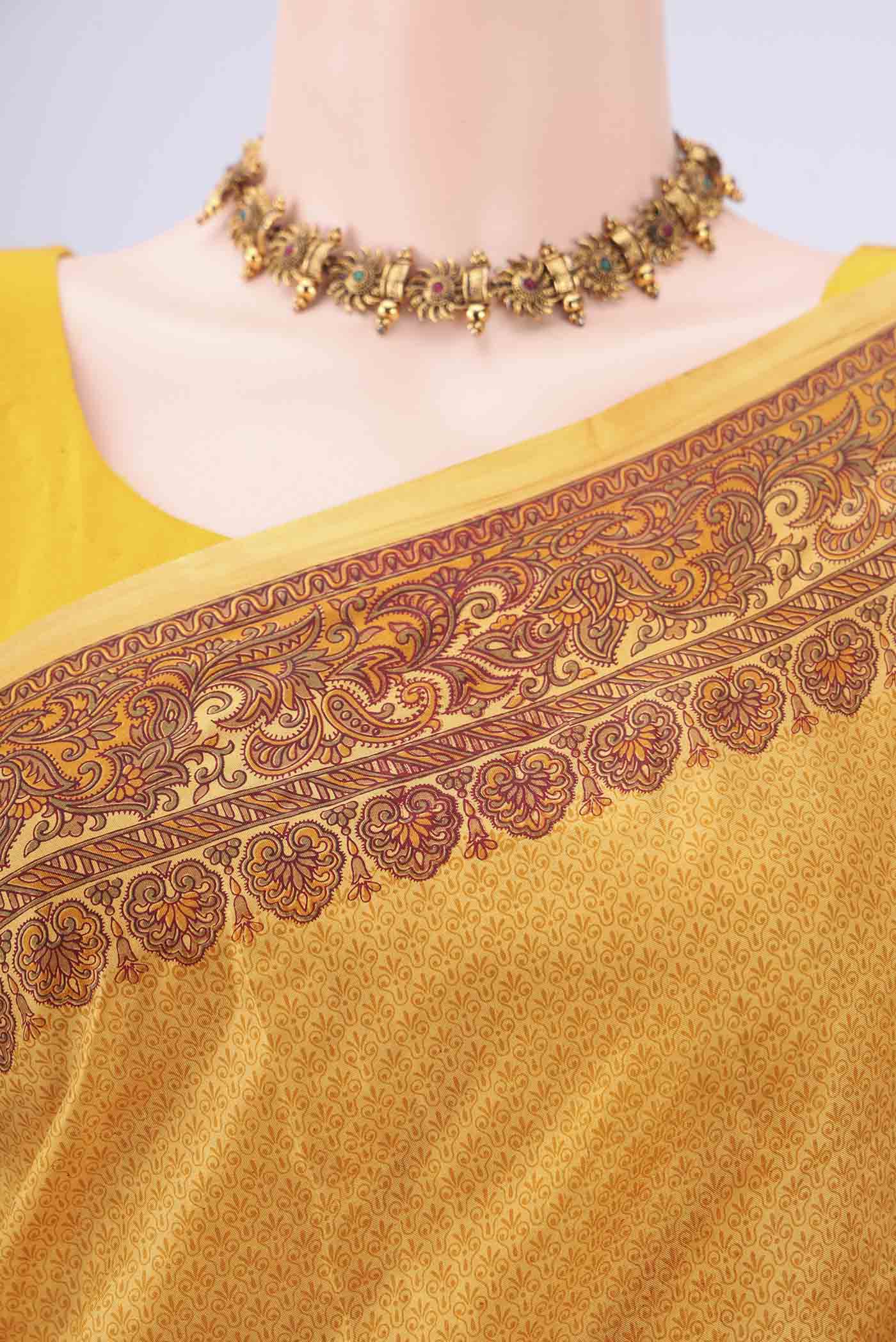 Border image of Mustard Printed Silk Saree with Floral Print on the body and Printed Border. 