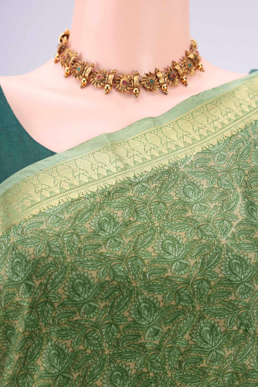 Border image of Light Green Printed Silk Saree with Printed design on the body and Zari Border. 