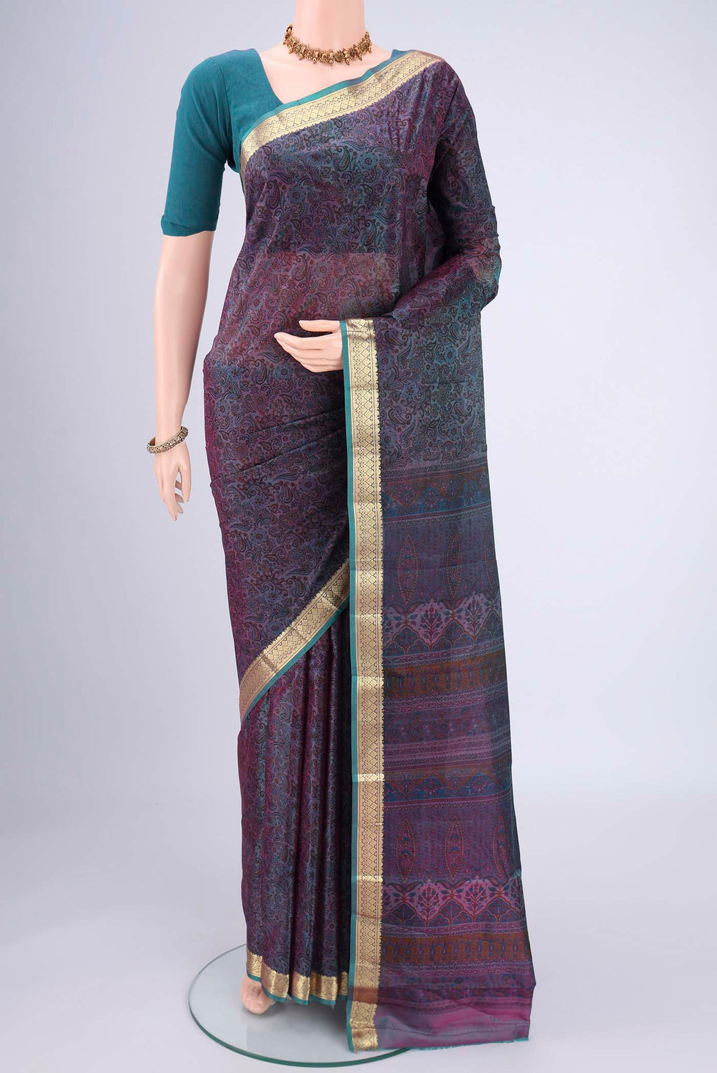 Purple Dual Tone Printed Silk Saree with Printed design on the body and Zari Border.  displayed on a mannequin