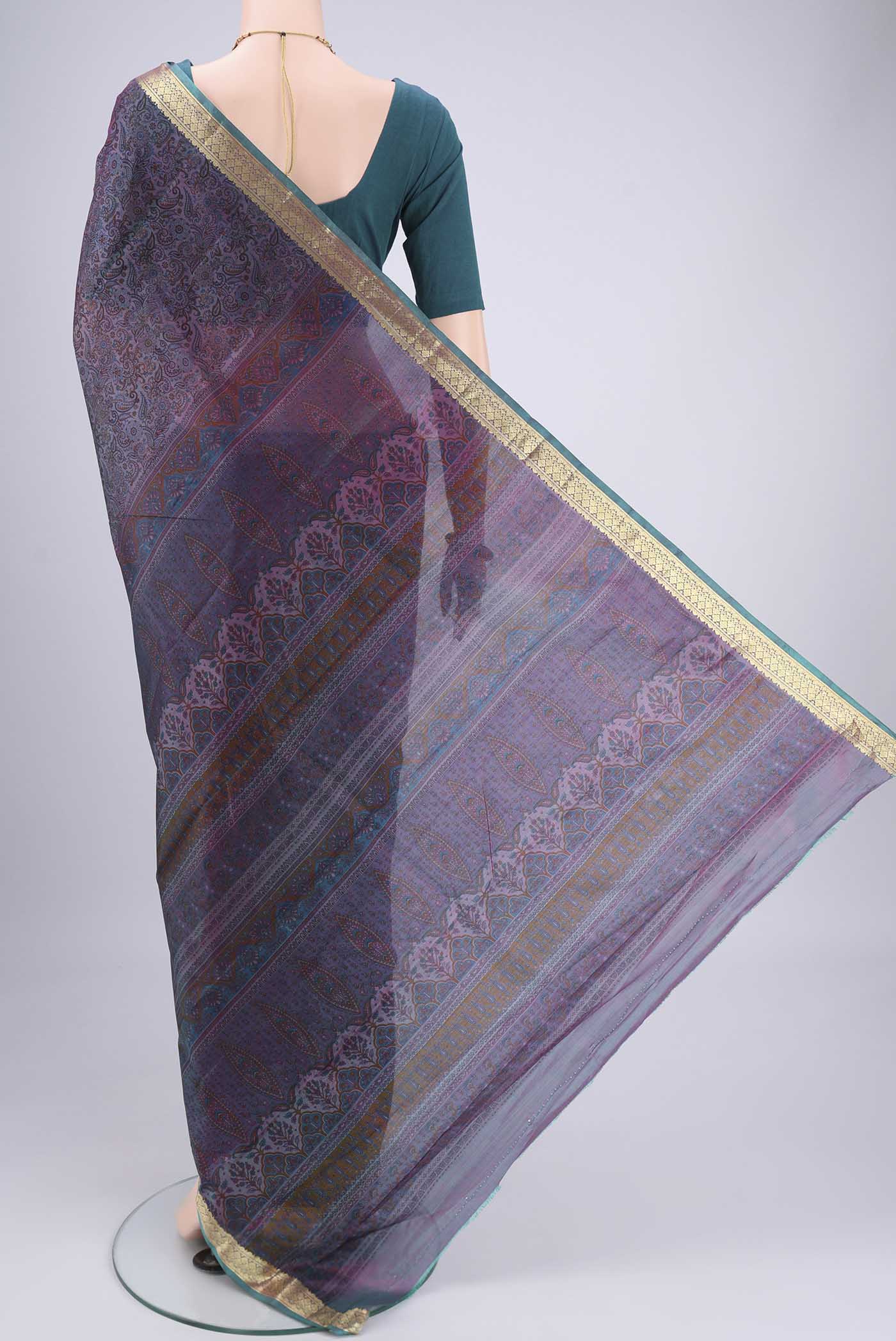 Flat view of Purple Dual Tone Printed Silk Saree with Printed design on the body and Zari Border. 
