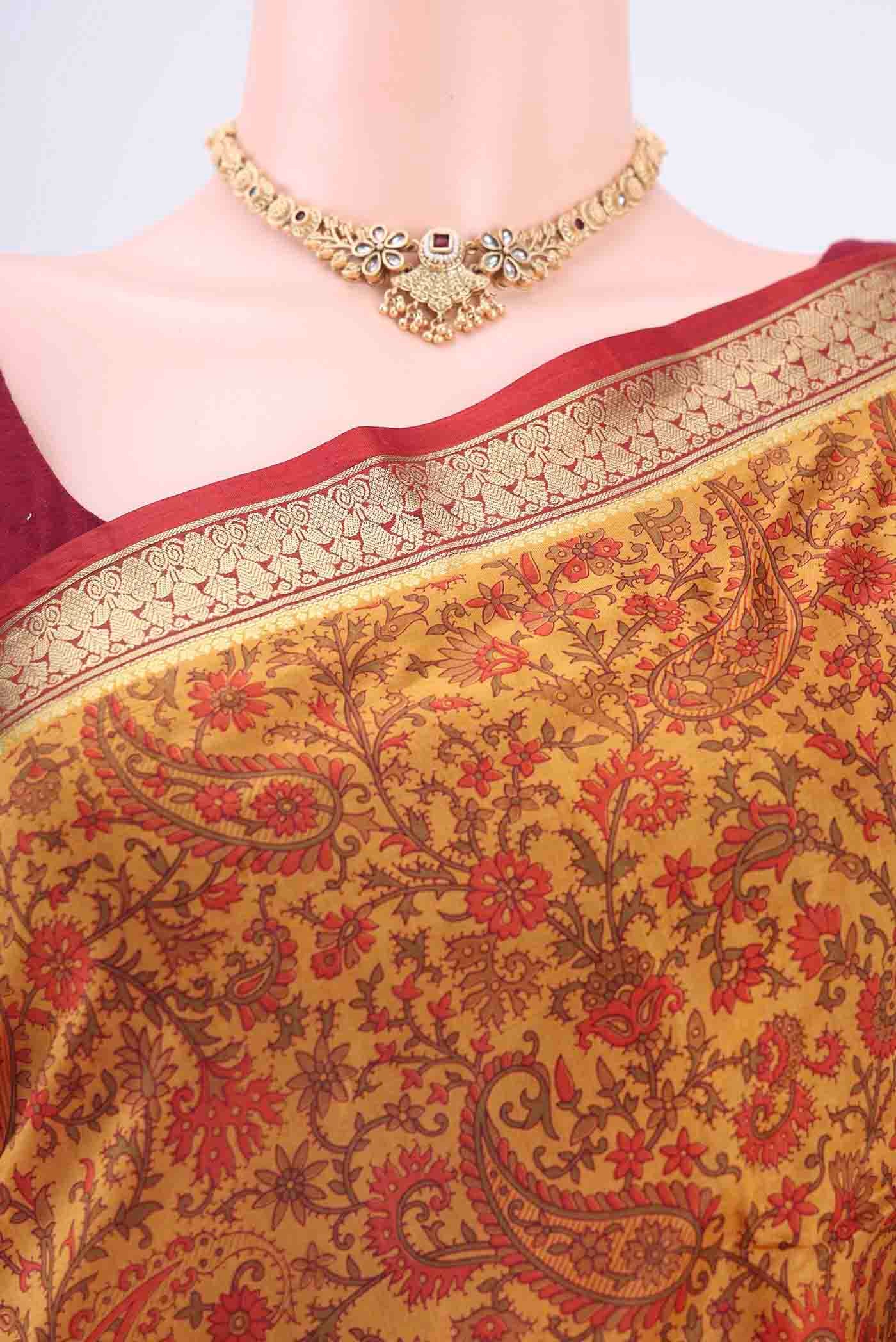 Border image of Yellow Printed Silk Saree with Floral Print on the body and Zari Border