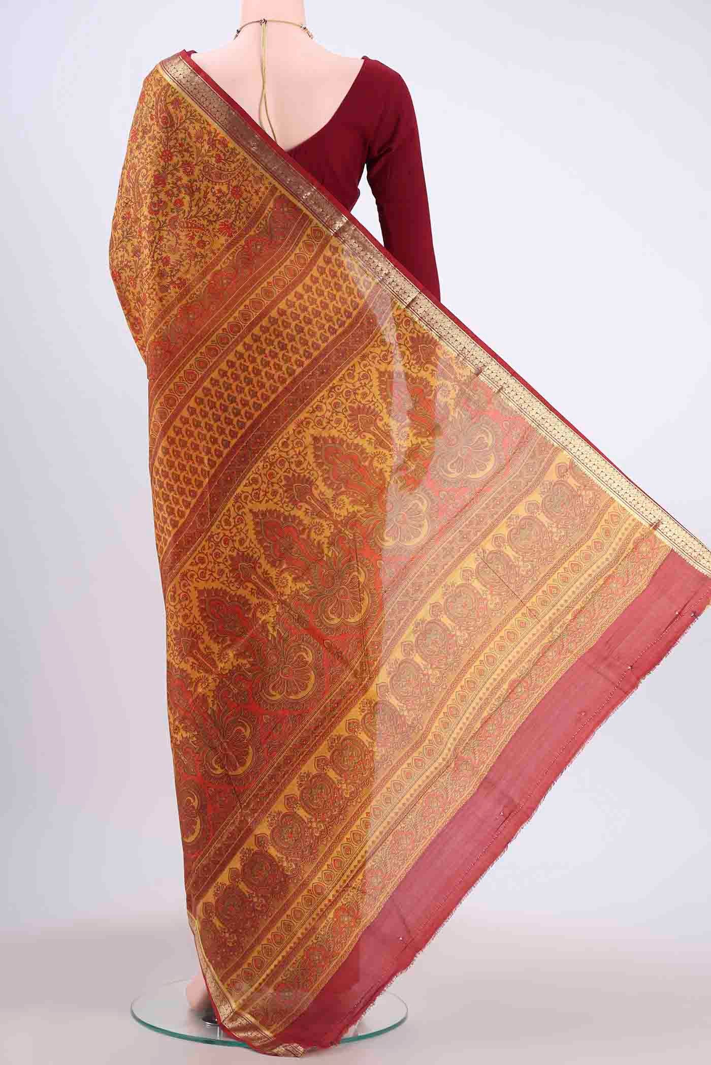 Flat view of Yellow Printed Silk Saree with Floral Print on the body and Zari Border