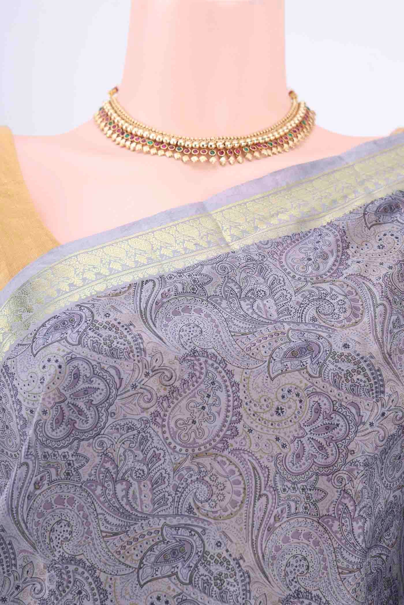Border image of Blue Grey Printed Silk Saree with Floral Print on the body and Zari Border