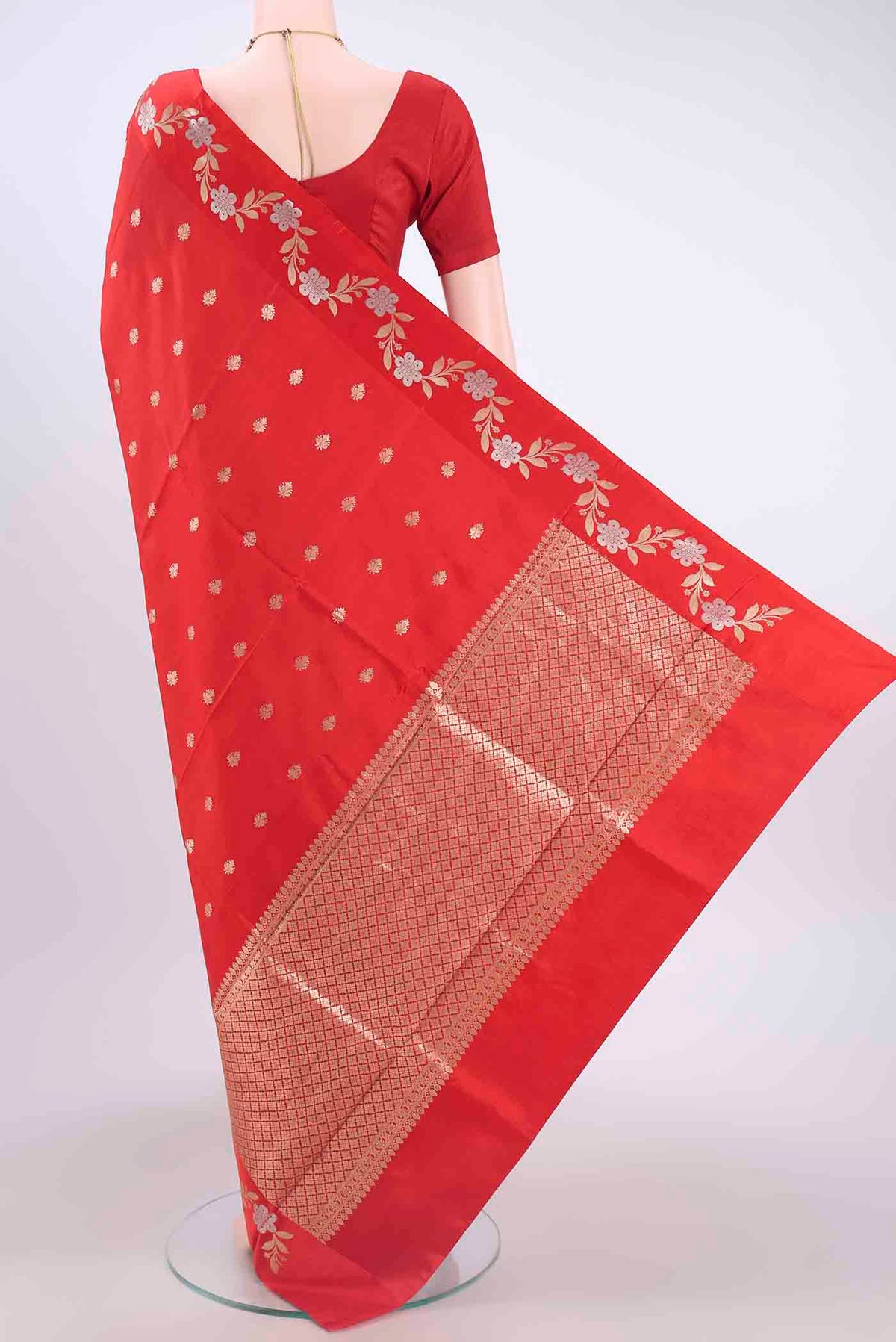 Flat view of Red Banarasi Katan Silk Saree with Zari Butta on the body and Meenakari Border