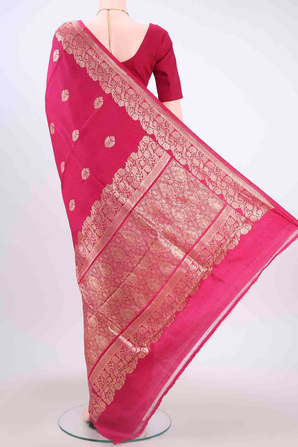 Flat view of Rani Pink Dual Tone Banarasi Katan Silk Saree with Zari Butta on the body and Meenakari Border