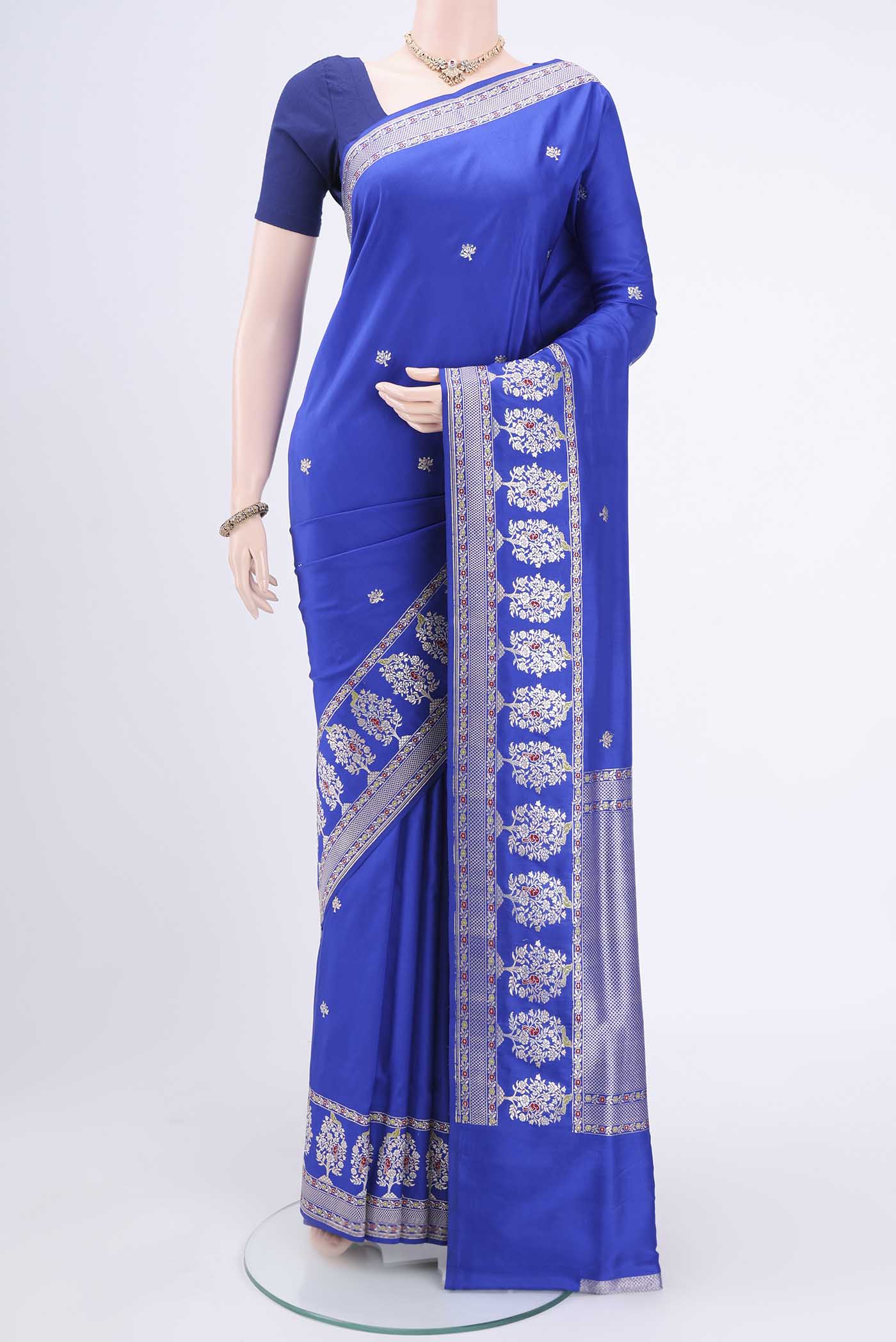 Royal Blue Banarasi Silk Saree with Zari Butta on the body and Zari And Thread Border.  displayed on a mannequin