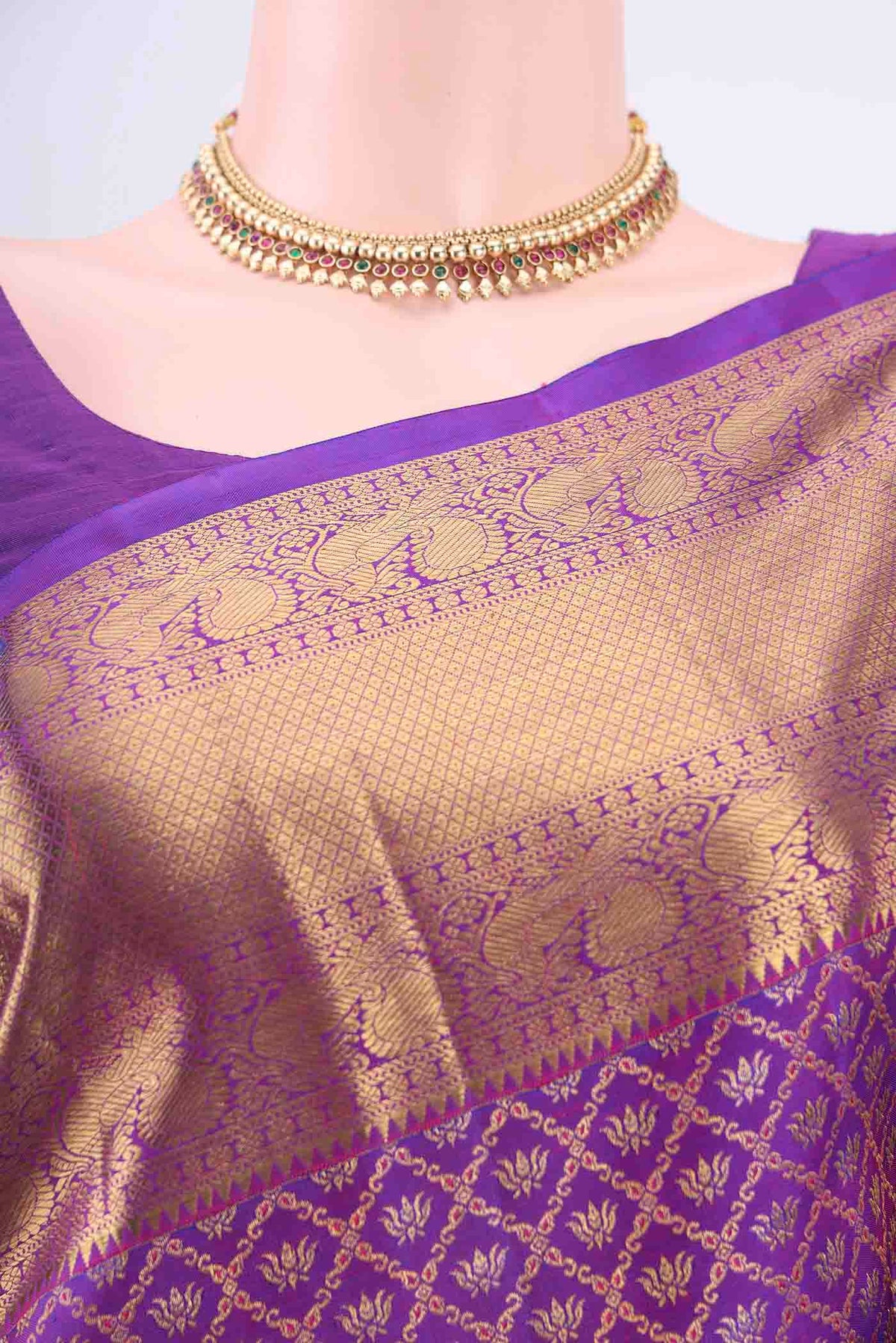 Border image of Purple Kanchipuram Silk Saree with Zari Brocade on the body and Zari Border