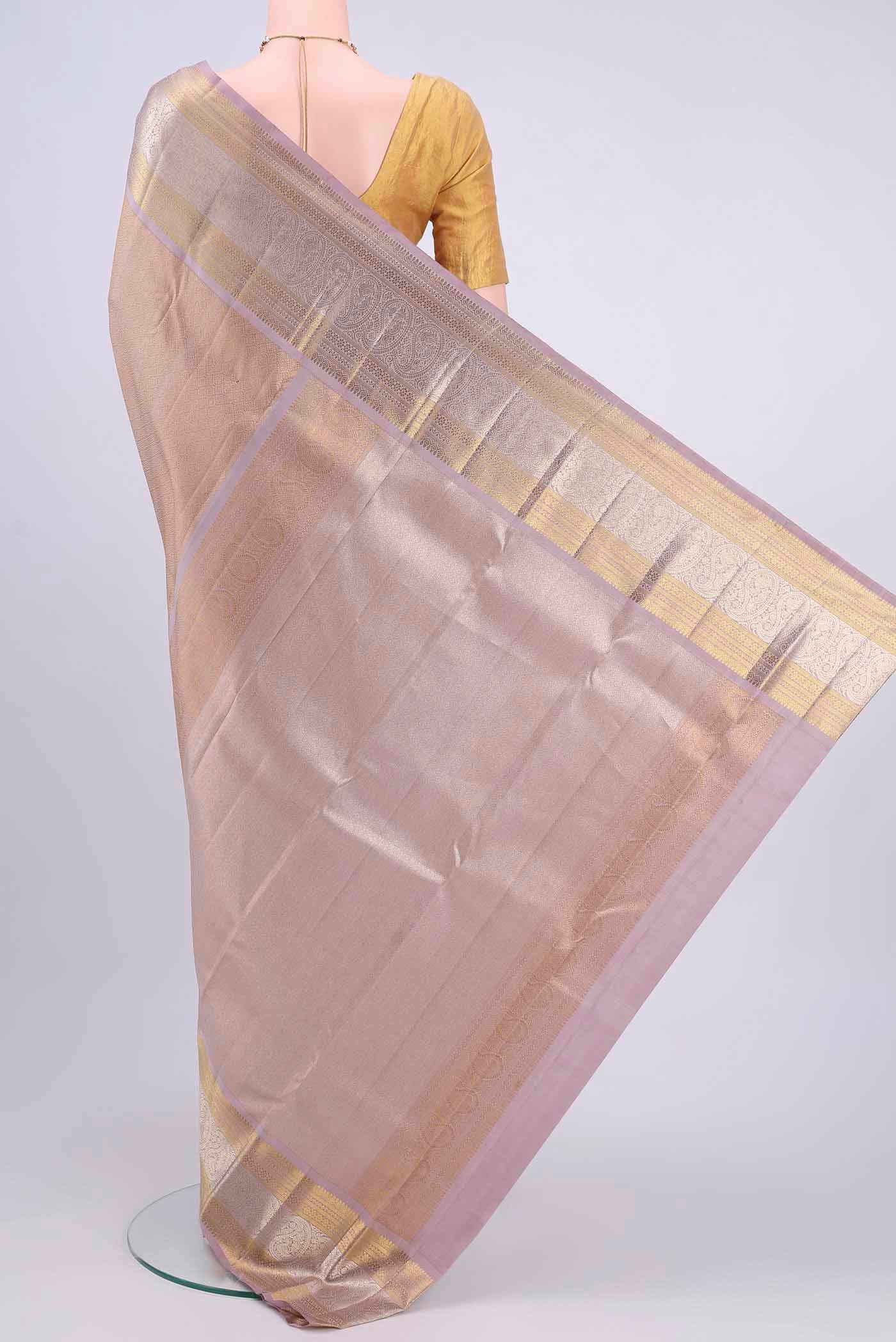 Flat view of Mauve Kanchipuram Saree with Zari Brocade on the body and Zari Border