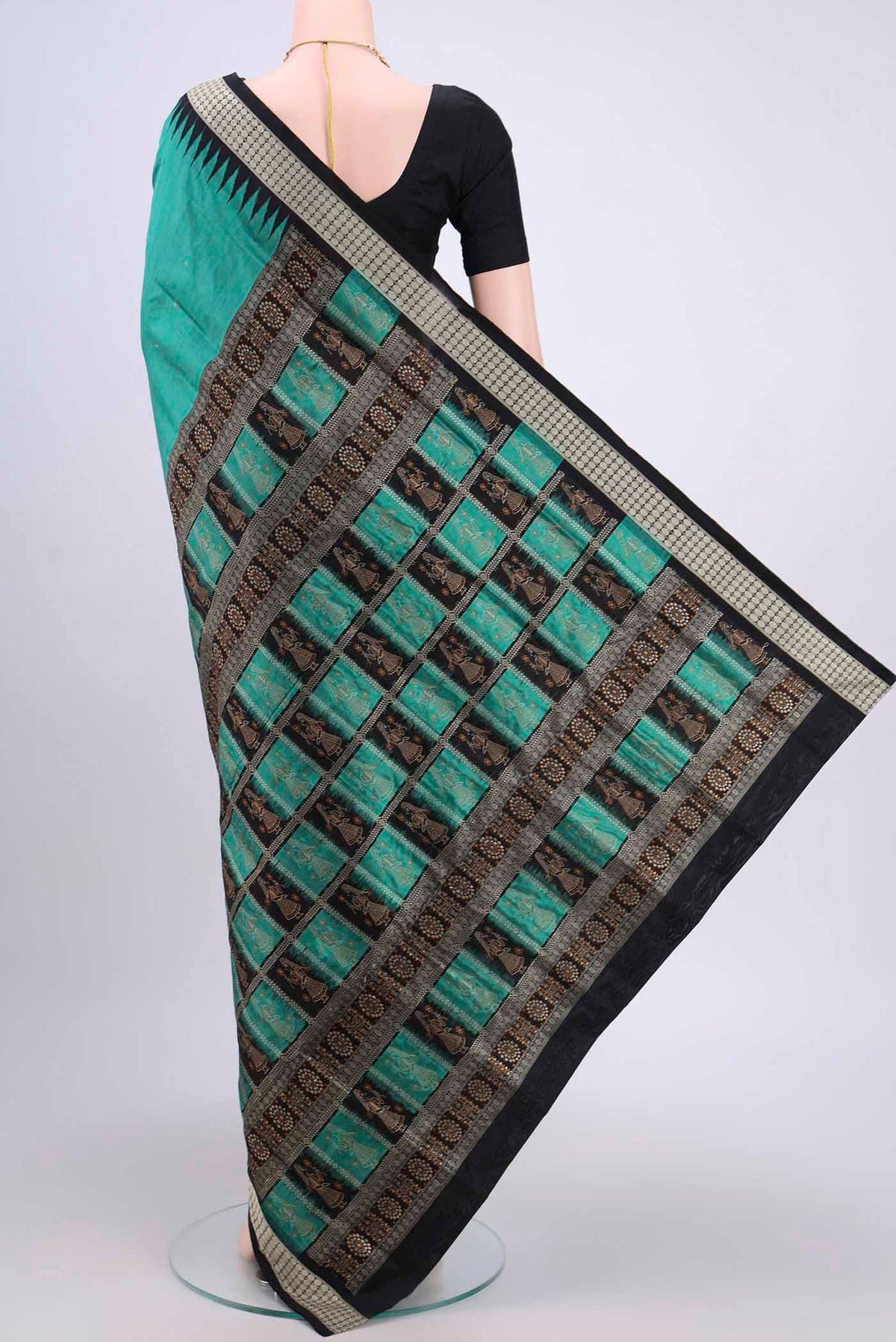 Flat view of Sea Green Orissa Silk Saree with Thread Butta on the body and Temple Border. 