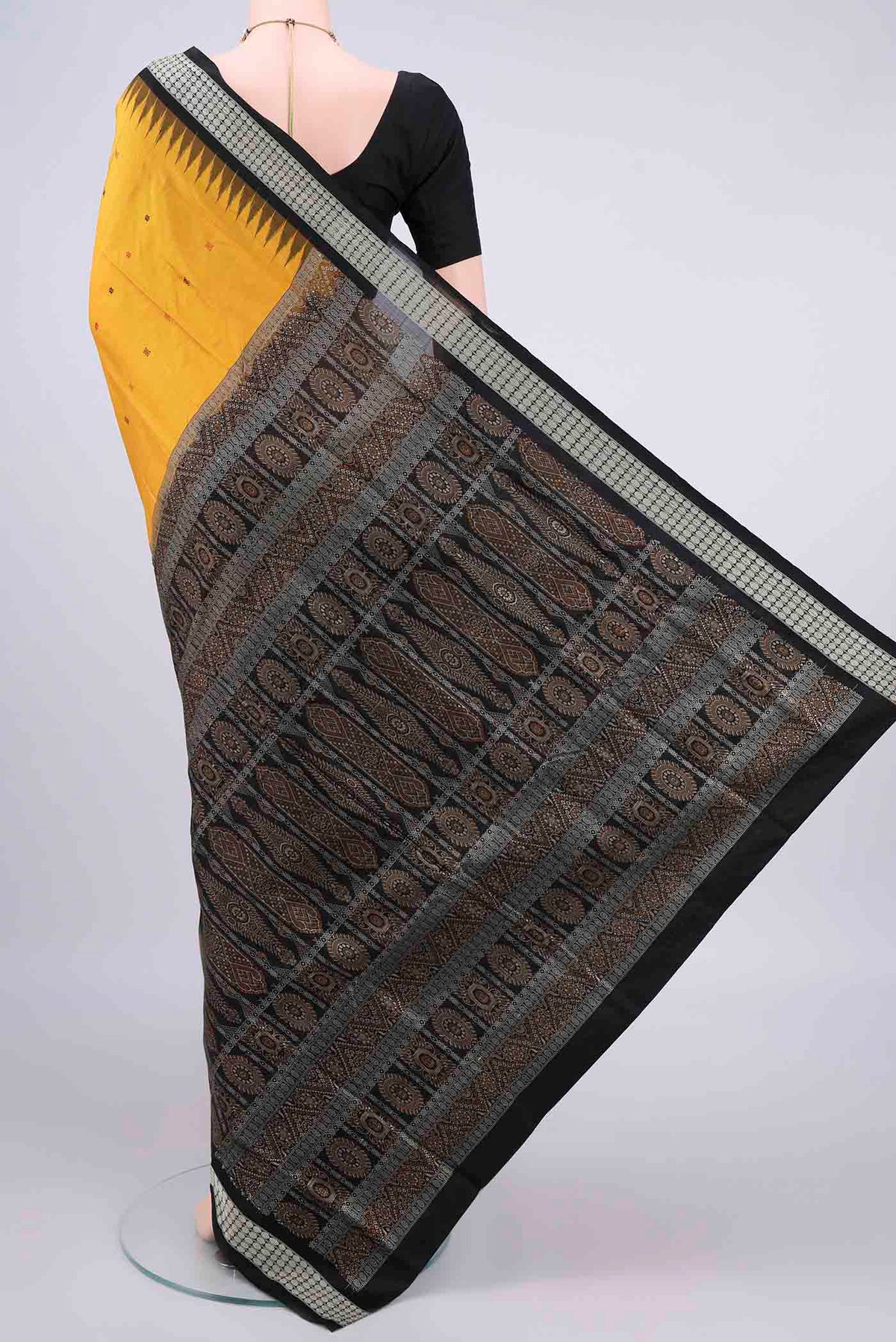 Flat view of Pure Silk Mustard Orissa Saree with Thread Butta on the body and Thread Border. 