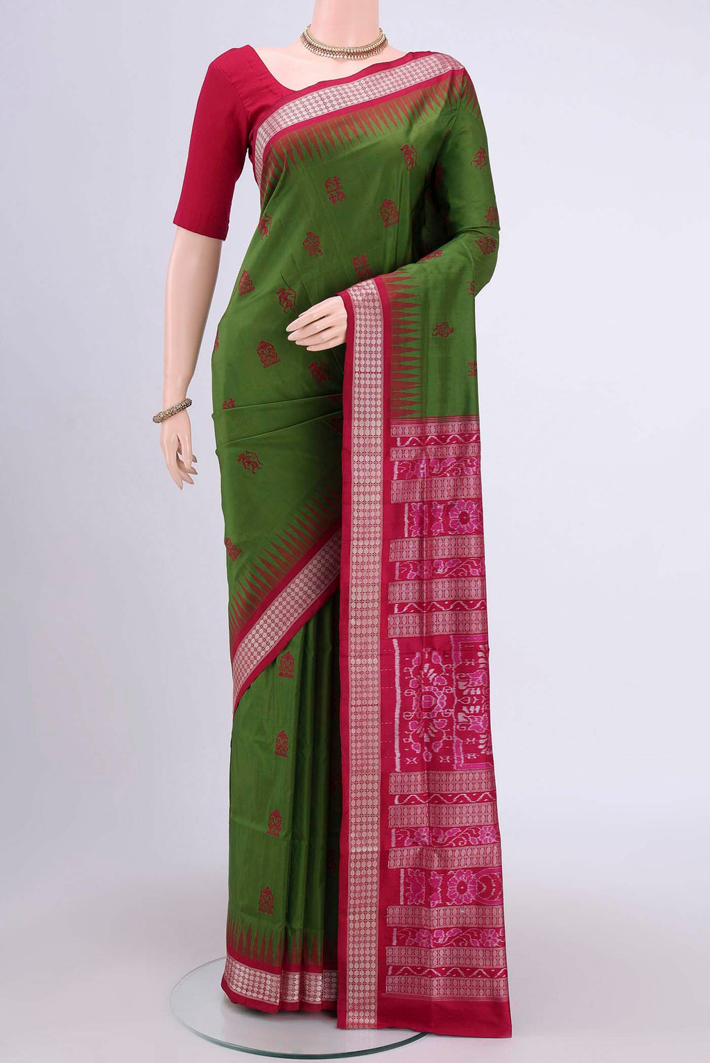 Mehandi Green Orissa Silk Saree with Thread Butta on the body and Thread Border.  displayed on a mannequin