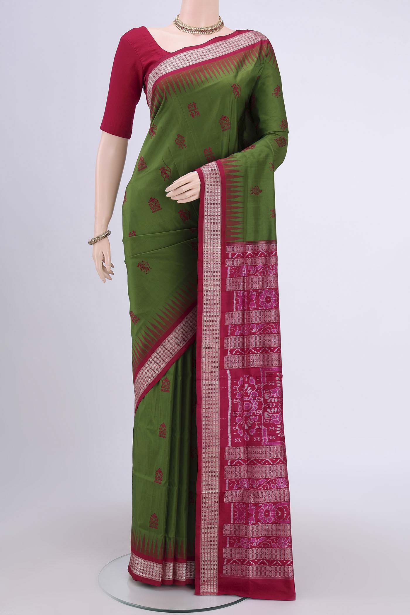 Mehandi Green Orissa Silk Saree with Thread Butta on the body and Thread Border.  displayed on a mannequin