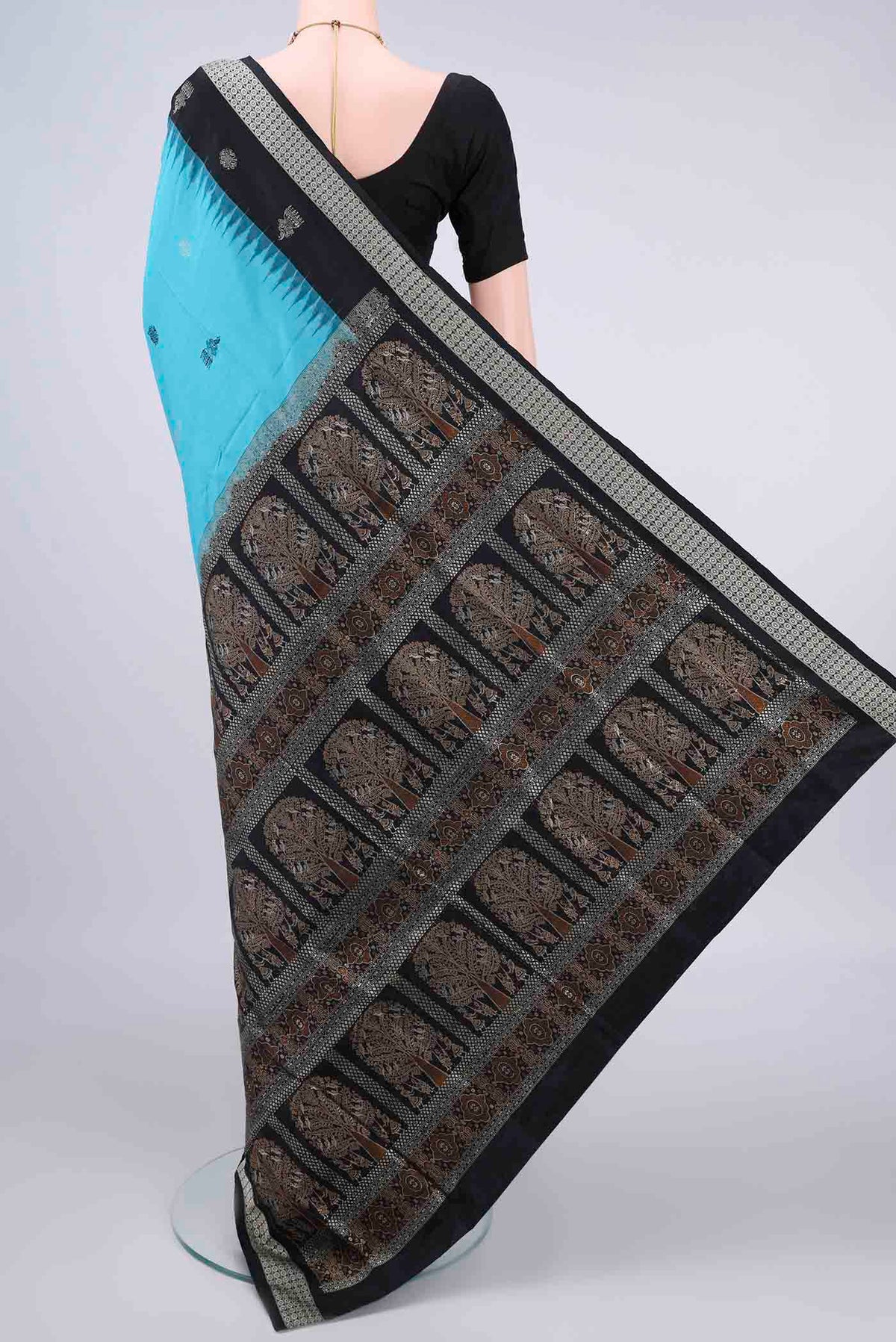 Flat view of Pure Silk Turquoise Orissa Saree with Thread Butta on the body and Thread Border. 