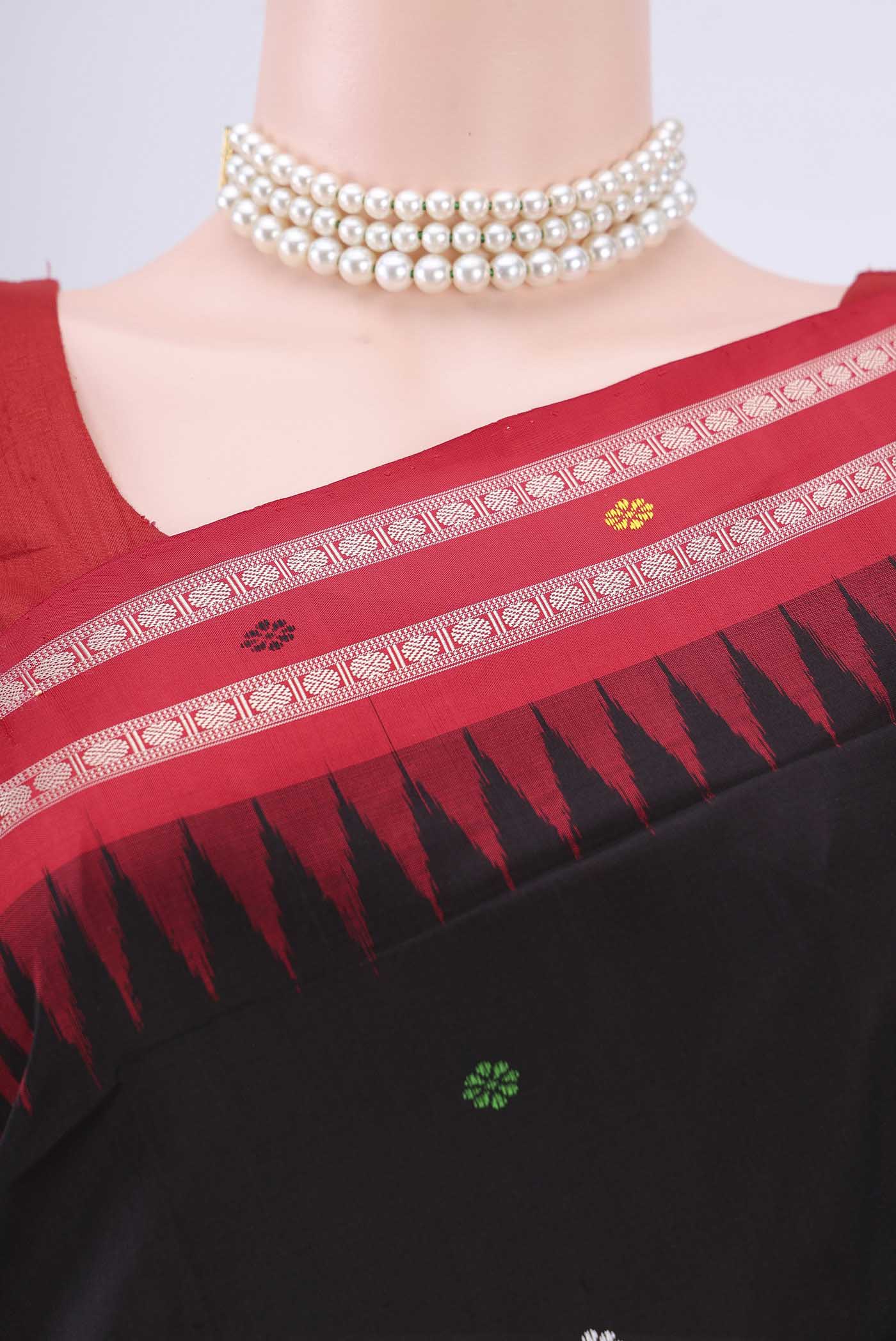 Border image of Black Orissa Silk Saree with Thread Butta on the body and Thread Border. 