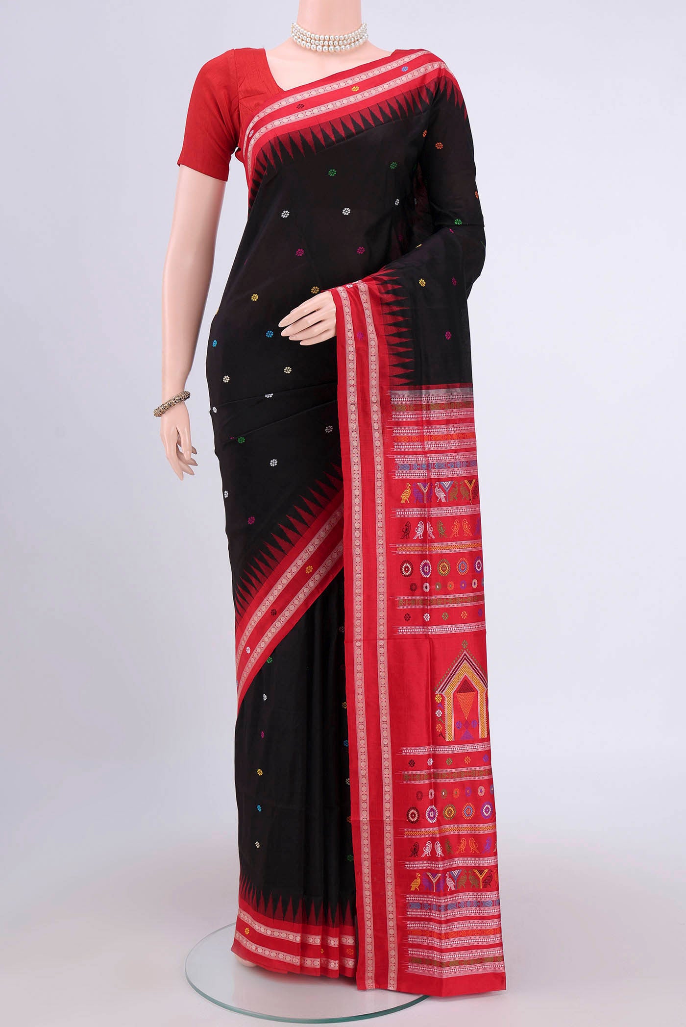 Black Orissa Silk Saree with Thread Butta on the body and Thread Border.  displayed on a mannequin