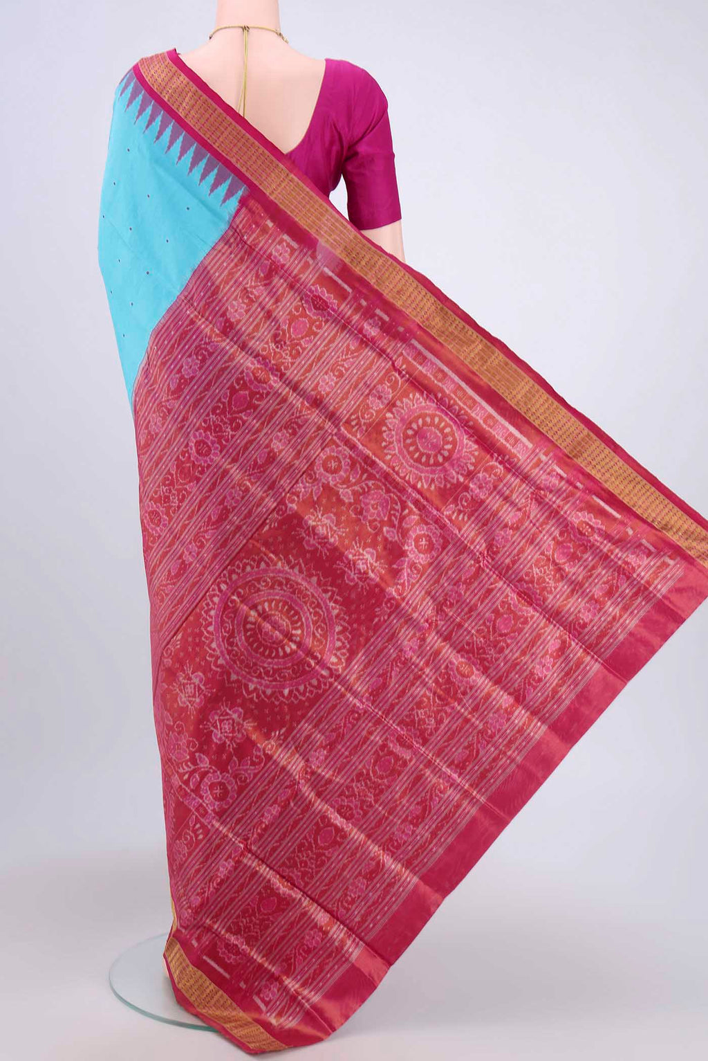 Flat view of Turquoise Orissa Silk Saree with Thread Butta on the body and Zari Border. 