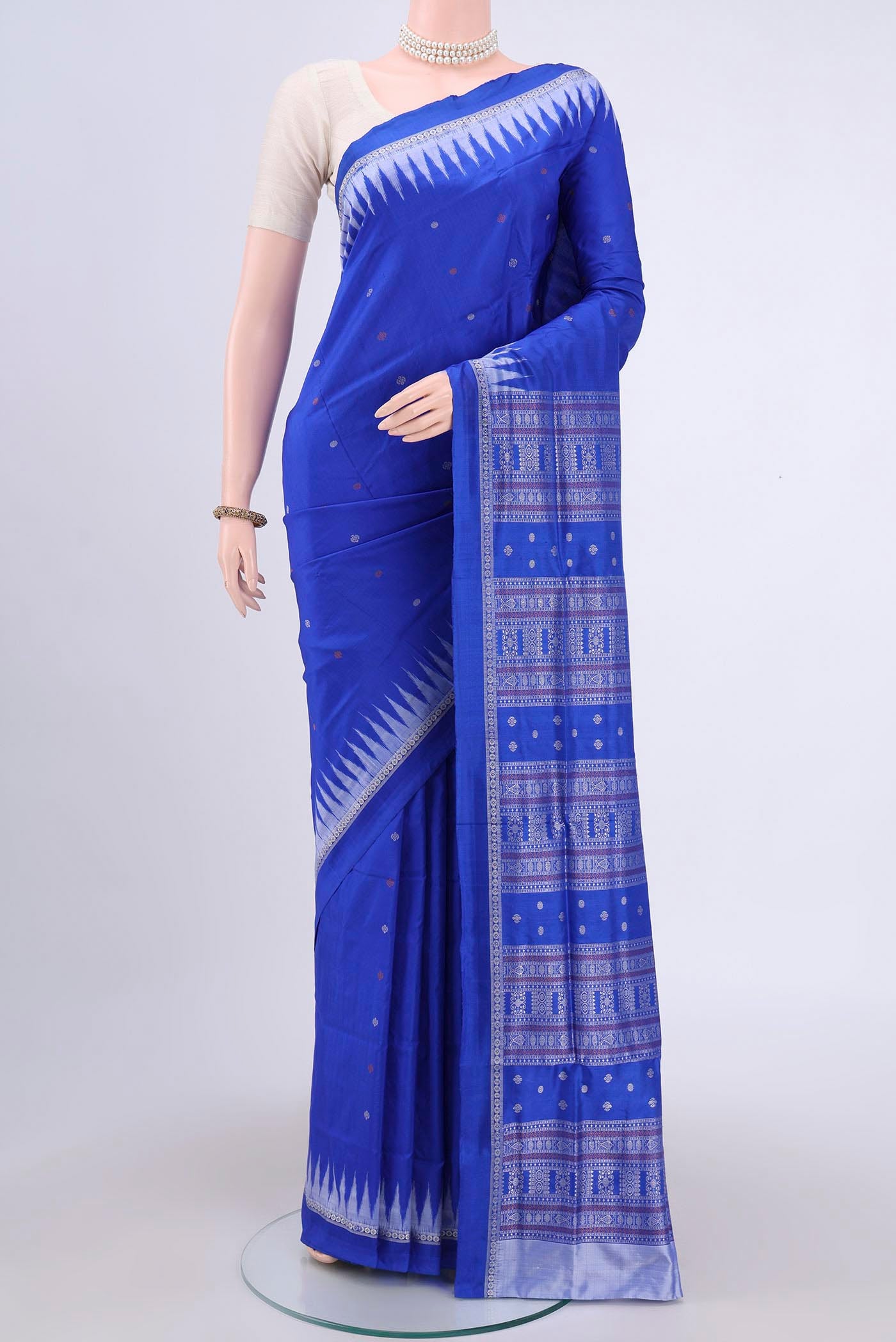 Royal Blue Orissa Silk Saree with Thread Butta on the body and Thread Border.  displayed on a mannequin