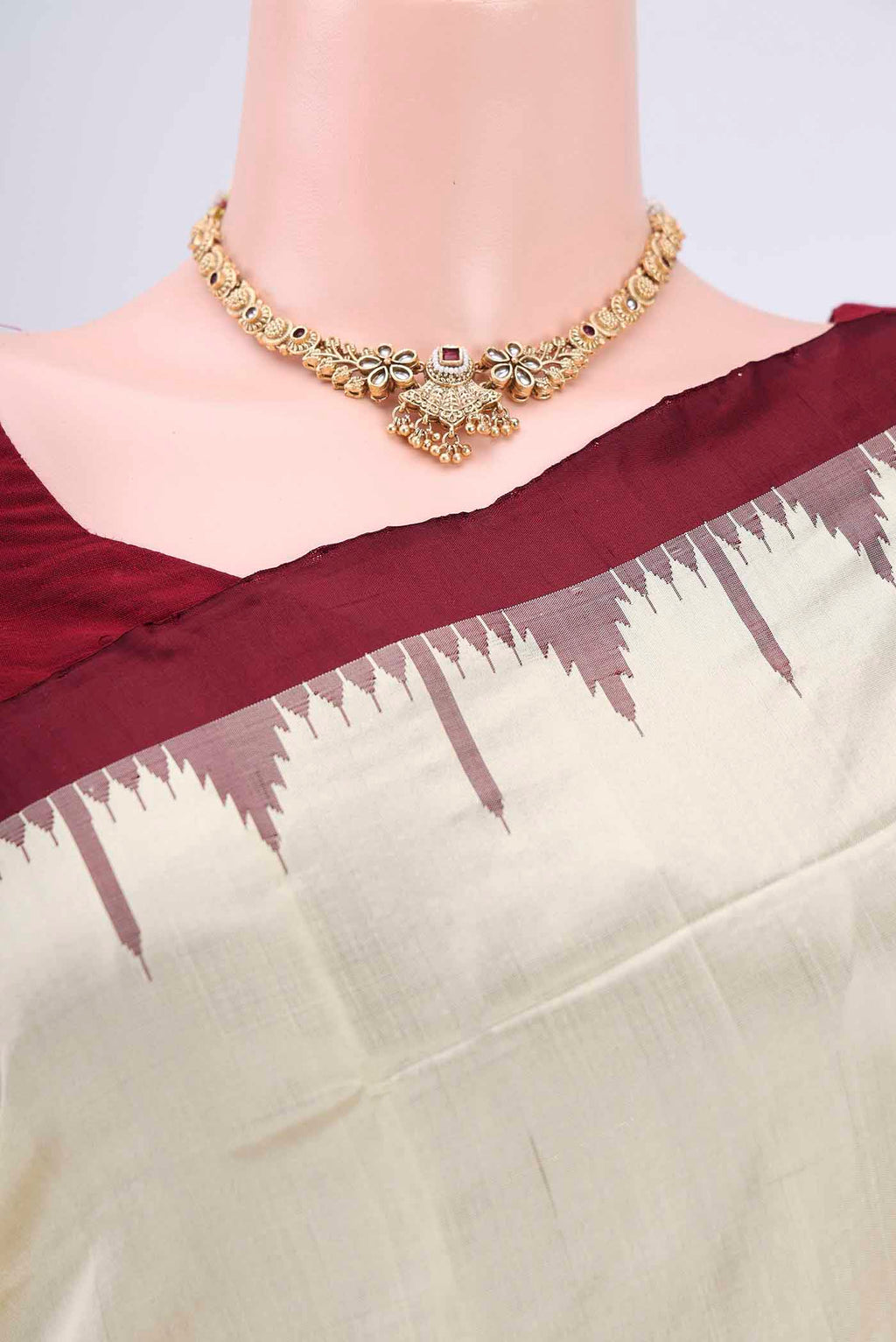 Border image of Cream Orissa Silk Saree with Plain Body and Temple Border. 