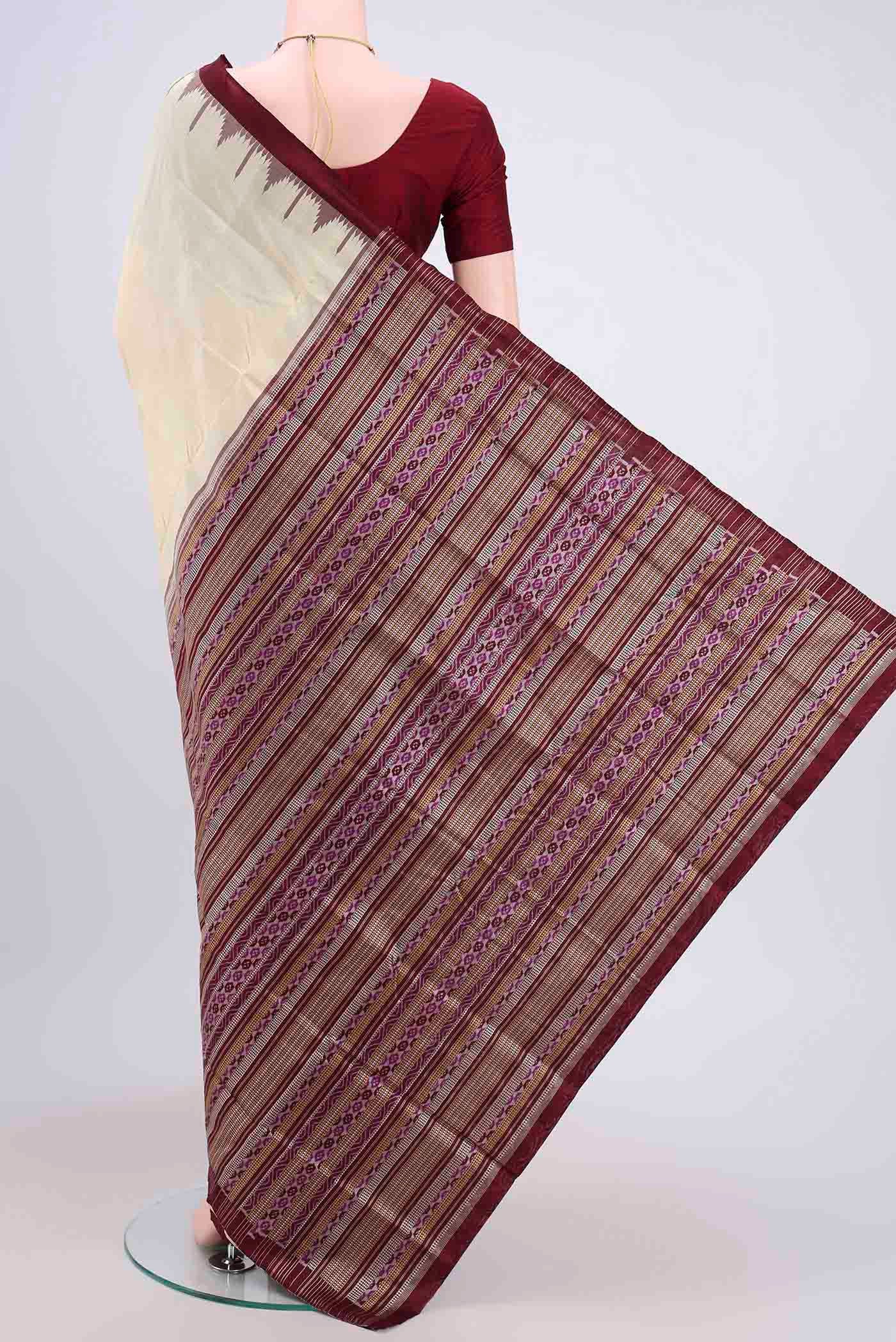 Flat view of Cream Orissa Silk Saree with Plain Body and Temple Border. 