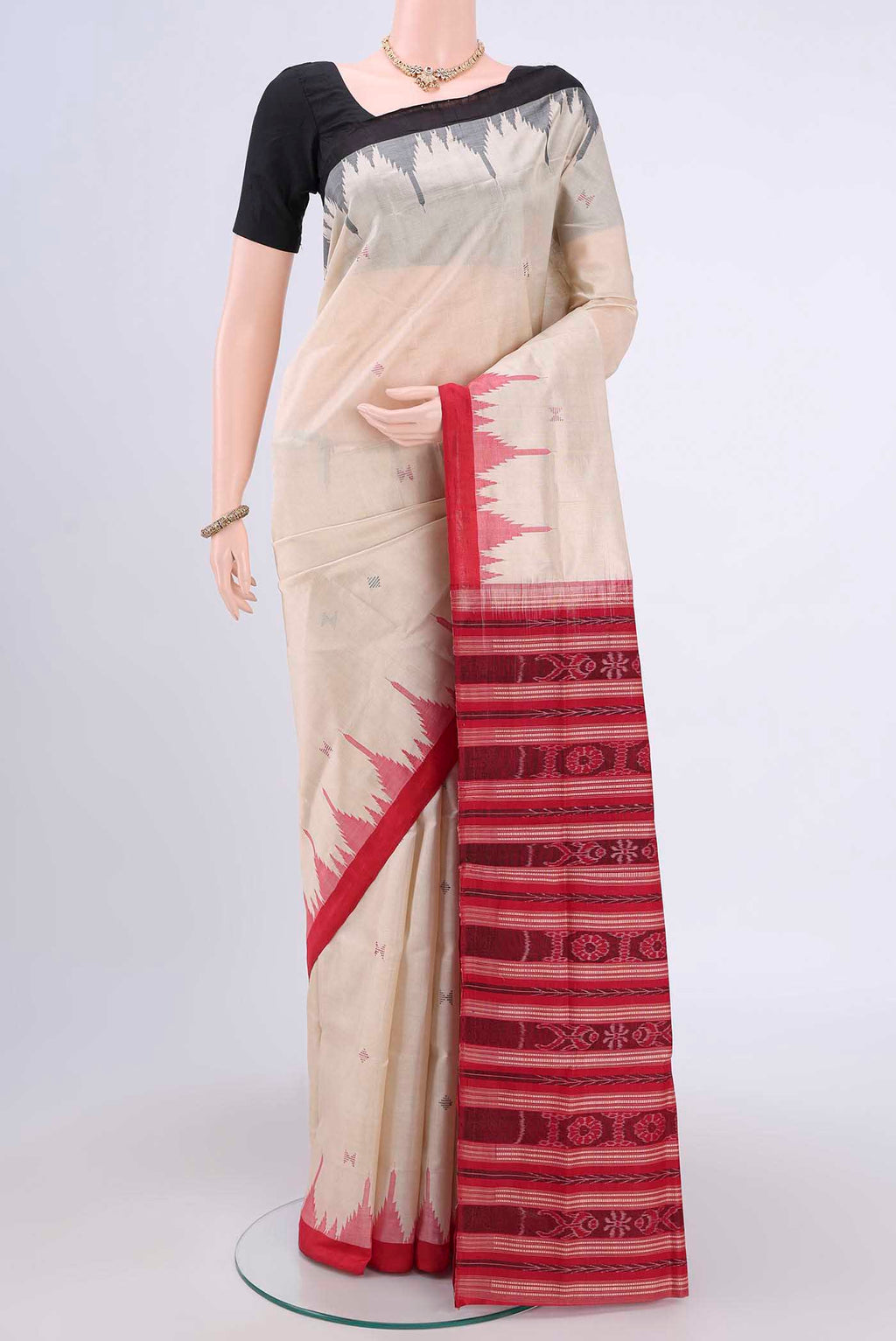 Beige Orissa Silk Saree with Plain Body and Ganga Jamuna Border.  displayed on a mannequin