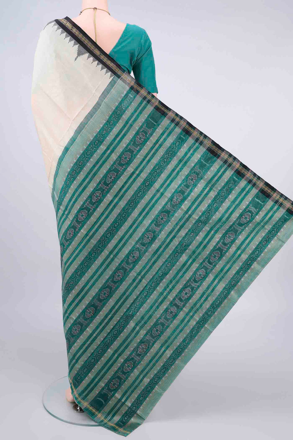 Flat view of Pure Silk Off White Orissa Saree with Plain Body and Ganga Jamuna Border. 